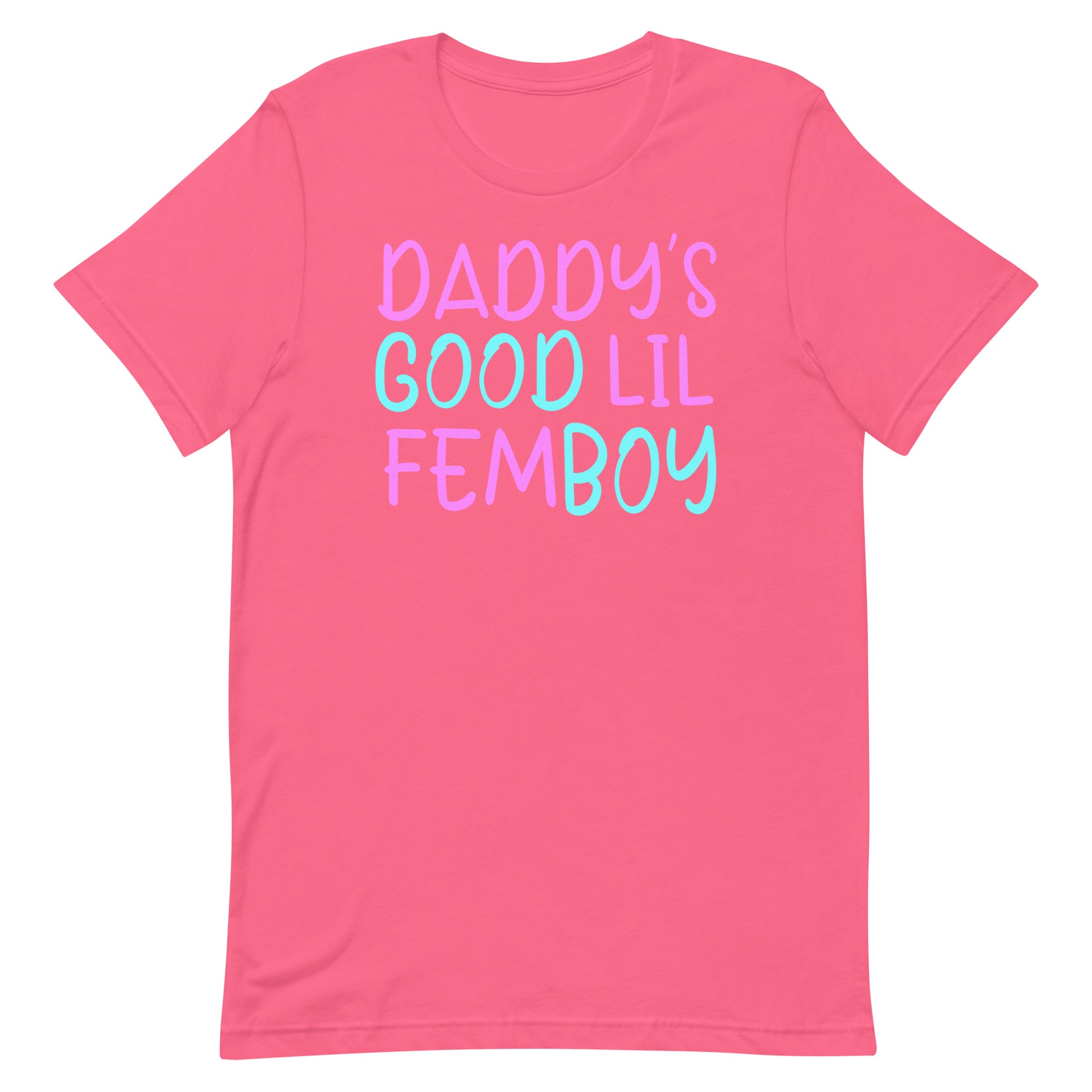 A pink short-sleeve crewneck t-shirt featuring the text 'DADDY'S GOOD LIL FEMBOY' printed on the chest in a pastel pink and light blue hand-drawn font, shown against a plain white background.