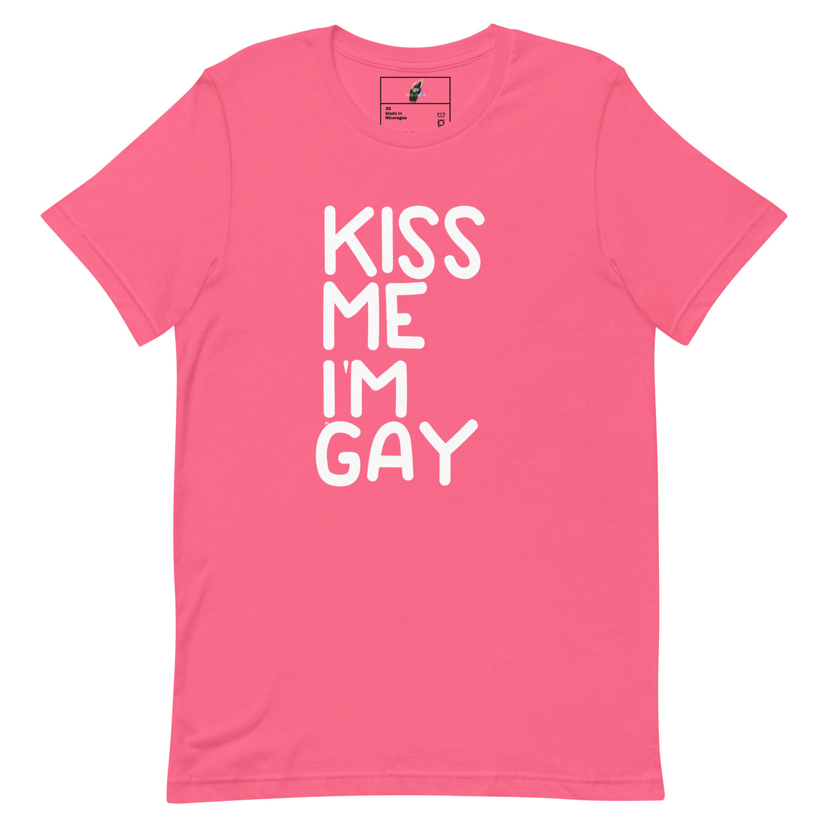 A bright pink short-sleeve t-shirt with the phrase 'KISS ME I'M GAY' printed vertically in bold white letters on the front, displayed flat against a solid white background.