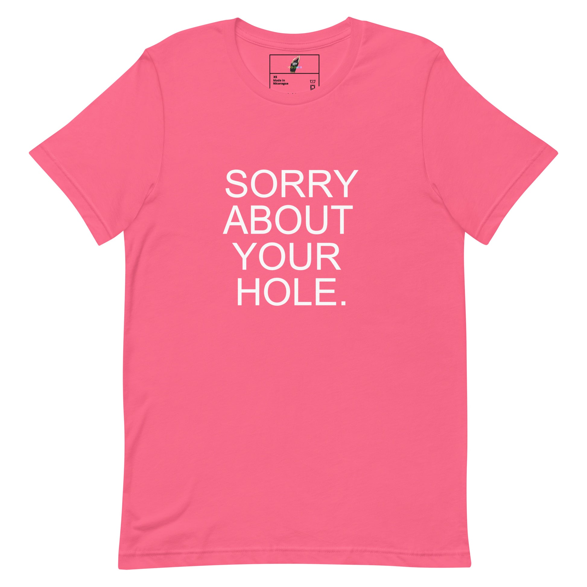 A pink short-sleeve crewneck t-shirt with the phrase 'SORRY ABOUT YOUR HOLE.' printed in bold white capital letters on the front, displayed flat against a solid white background.