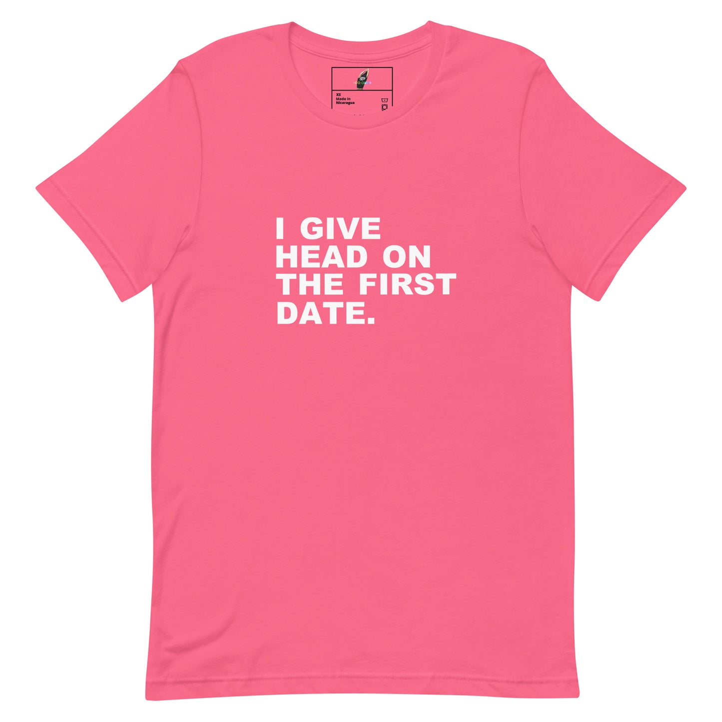 A bright pink short-sleeve crewneck t-shirt with bold white text on the chest that reads 'I GIVE HEAD ON THE FIRST DATE.'