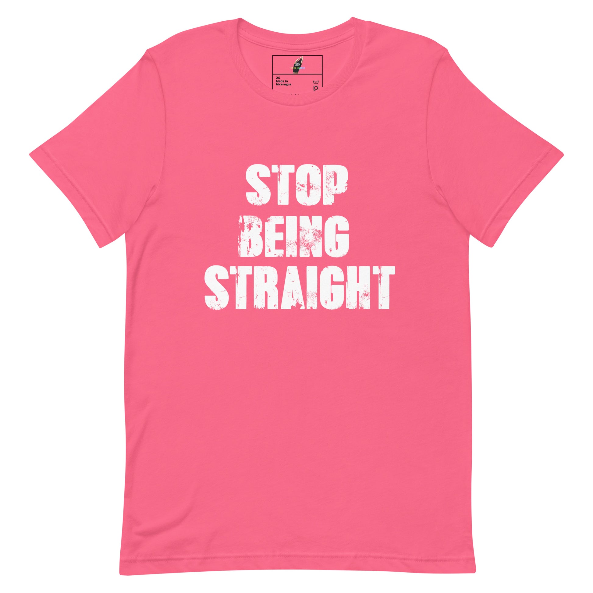 A pink short-sleeve crewneck t-shirt with the phrase 'STOP BEING STRAIGHT' printed in a distressed white font on the front, displayed against a solid white background.