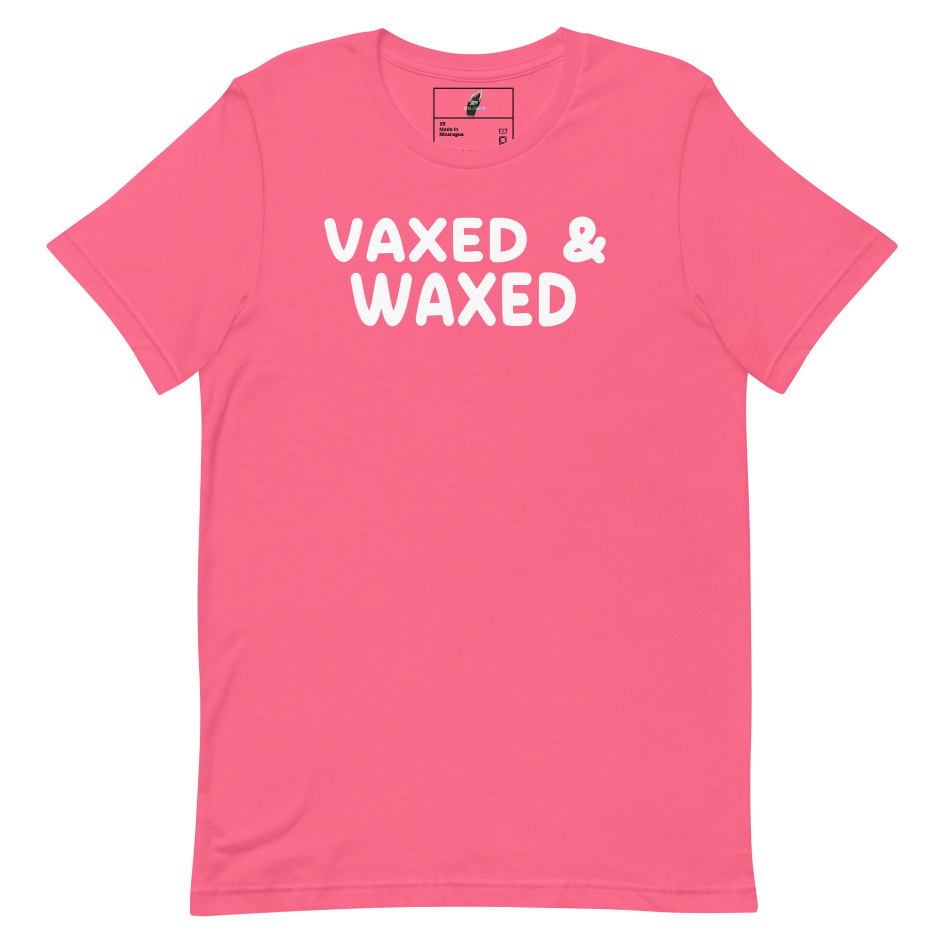 A bright pink short-sleeve crewneck t-shirt with the words 'VAXED & WAXED' printed in bold white capital letters across the chest, displayed flat against a solid white background.
