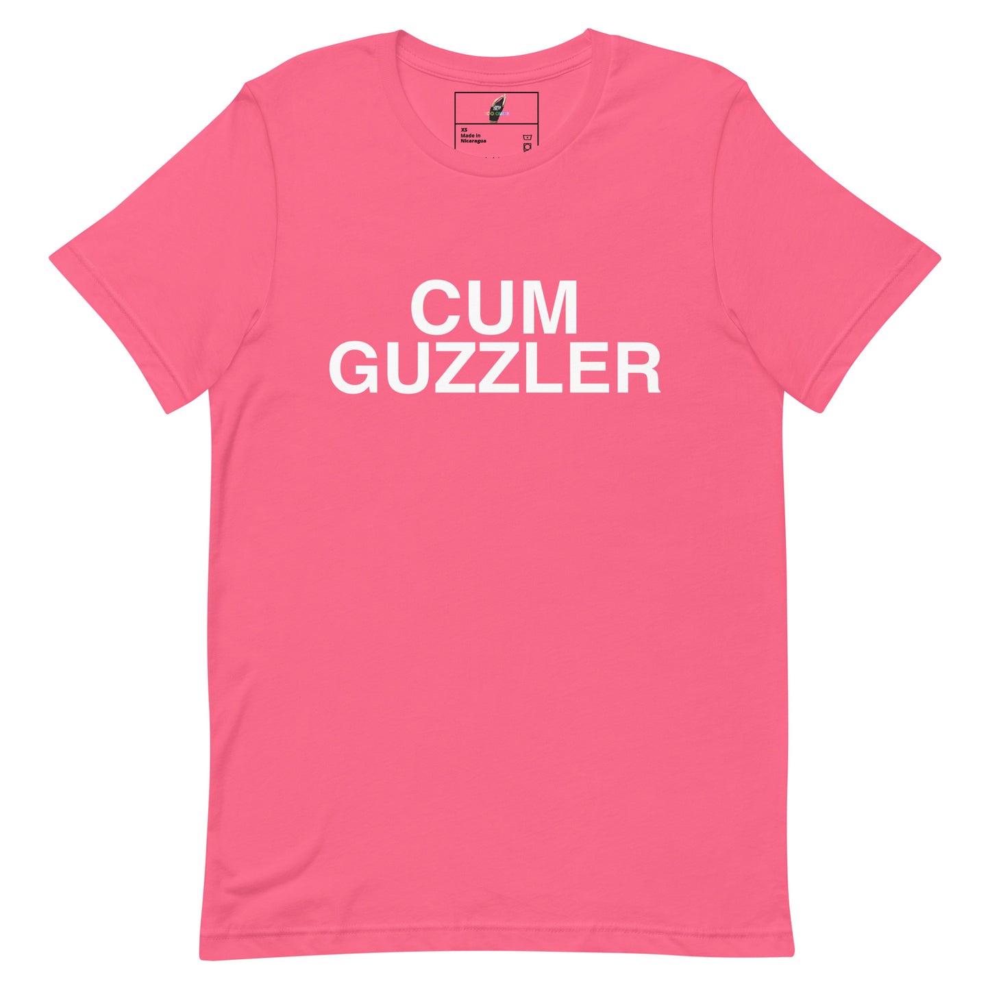 A bright pink short-sleeve t-shirt with the words 'CUM GUZZLER' printed in bold white capital letters across the chest, displayed flat against a plain white background.