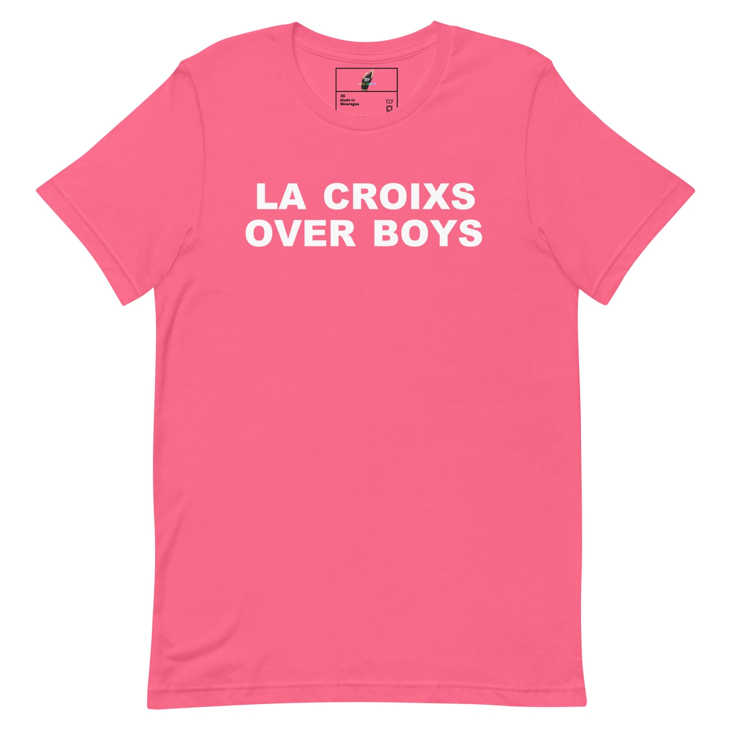 A bright pink short-sleeve t-shirt with the phrase 'LA CROIXS OVER BOYS' printed in bold white capital letters across the chest, displayed flat against a solid white background.