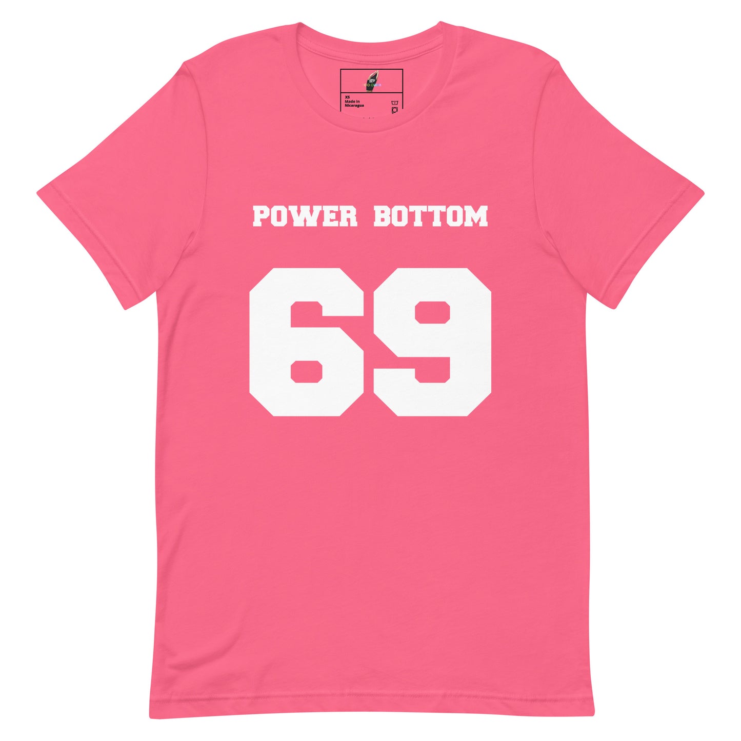 A pink short-sleeve crewneck t-shirt with 'POWER BOTTOM' printed in white block letters above the large white number '69' on the front, shown on a plain white background.