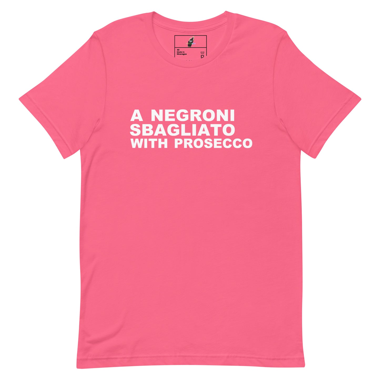 A pink short-sleeve crewneck t-shirt with bold white text on the chest reading 'A NEGRONI SBAGLIATO WITH PROSECCO'. The shirt is displayed flat against a solid white background, with a small brand label visible inside the collar.