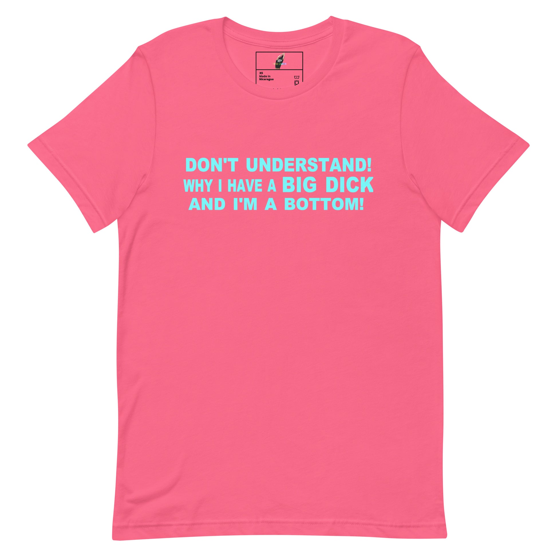 A bright pink short-sleeve t-shirt with a light blue graphic text print on the chest that reads 'DON'T UNDERSTAND! WHY I HAVE A BIG DICK AND I'M A BOTTOM!'. The shirt is displayed flat against a solid white background.