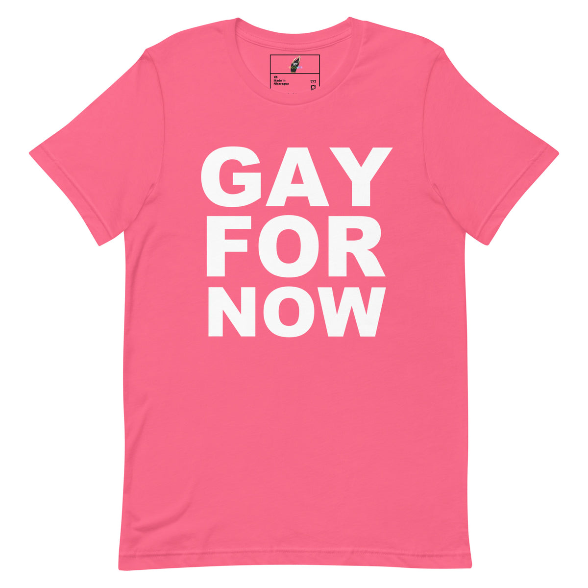 A pink short-sleeve crewneck t-shirt with the words 'GAY FOR NOW' printed in bold white capital letters on the front, displayed flat against a plain white background.
