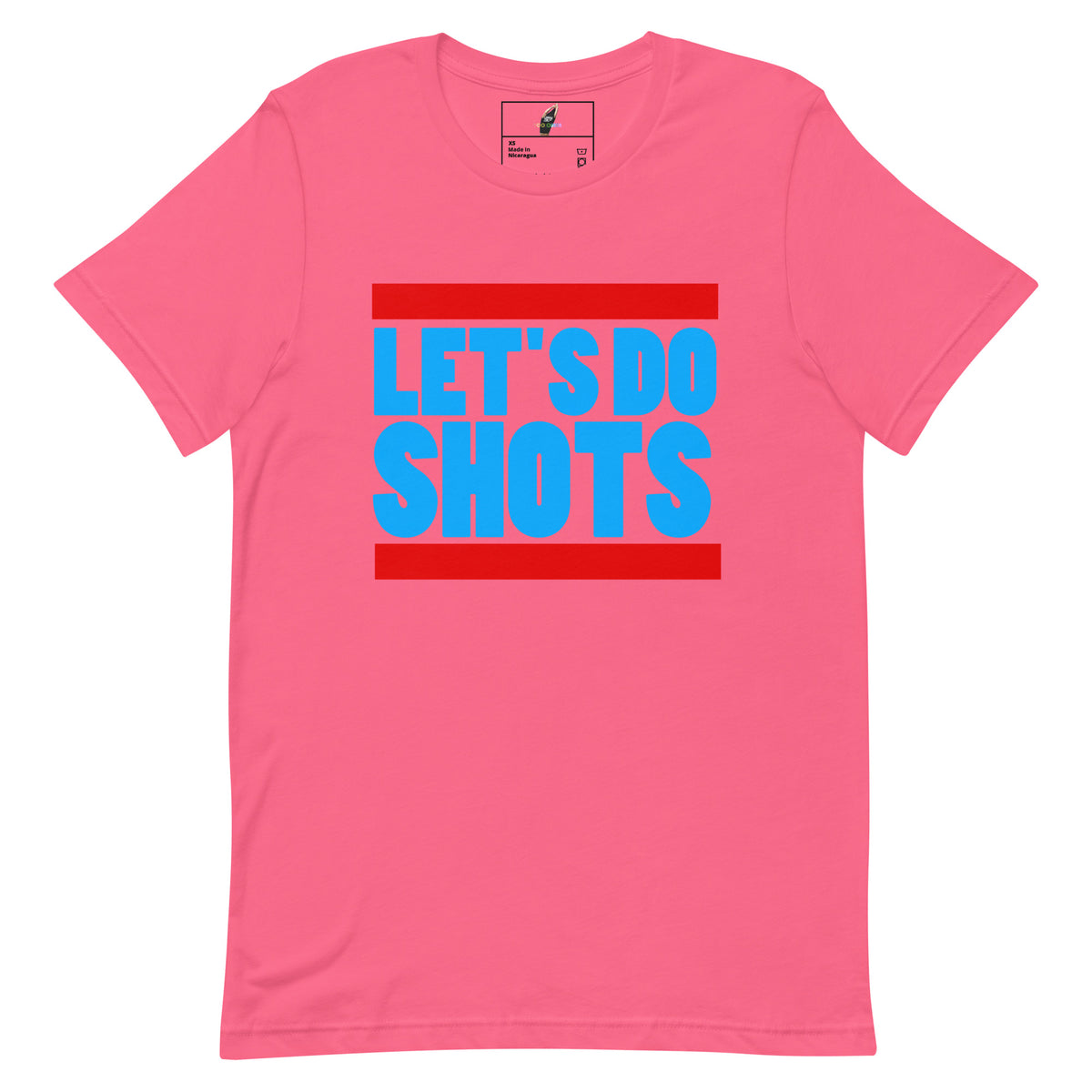 A pink short-sleeve crewneck t-shirt with a graphic on the chest reading 'LET'S DO SHOTS' in bright blue letters, framed by two red horizontal bars.