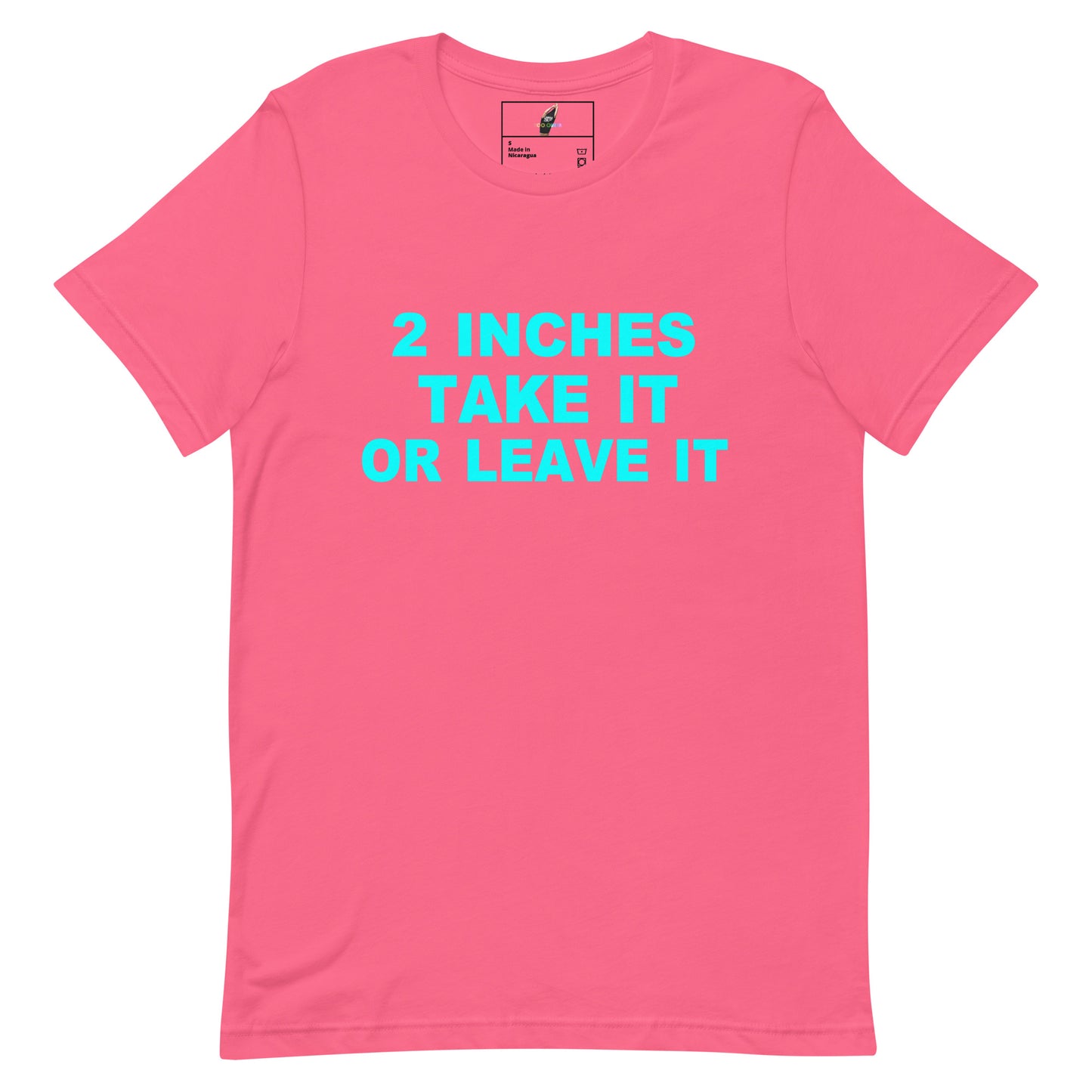 A bright pink short-sleeve crewneck t-shirt with the text '2 INCHES TAKE IT OR LEAVE IT' printed in a vibrant cyan blue font across the chest.