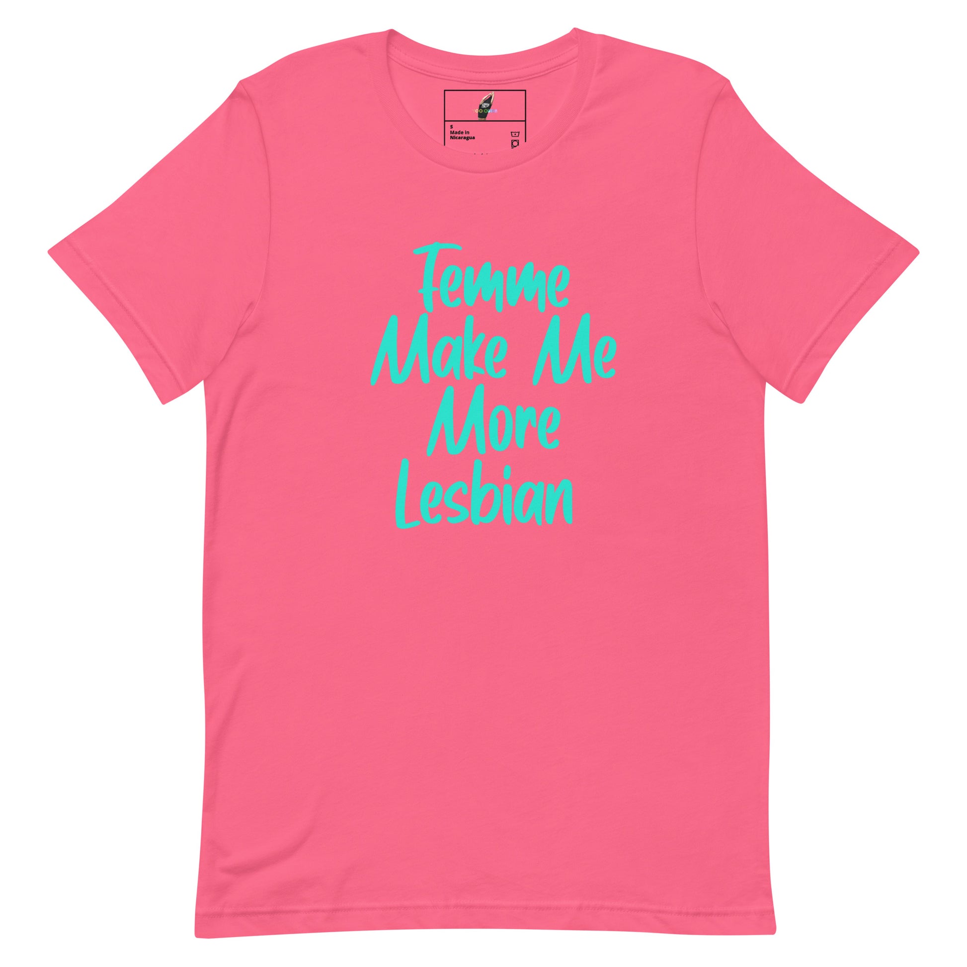 A pink short-sleeve crewneck t-shirt with the phrase 'Tempting Make Me More Lesbian' printed in a bright teal cursive font across the chest.