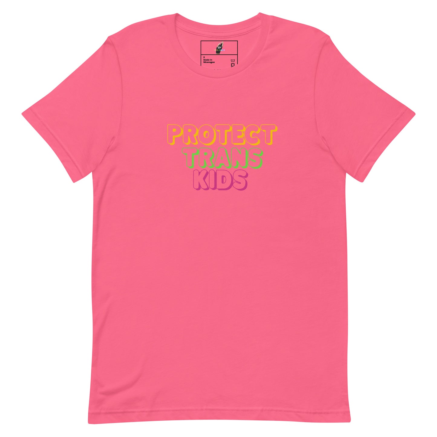 A pink short-sleeve crewneck t-shirt with the text 'PROTECT TRANS KIDS' printed on the chest in yellow, green, and pink lettering, displayed on a clean white background.