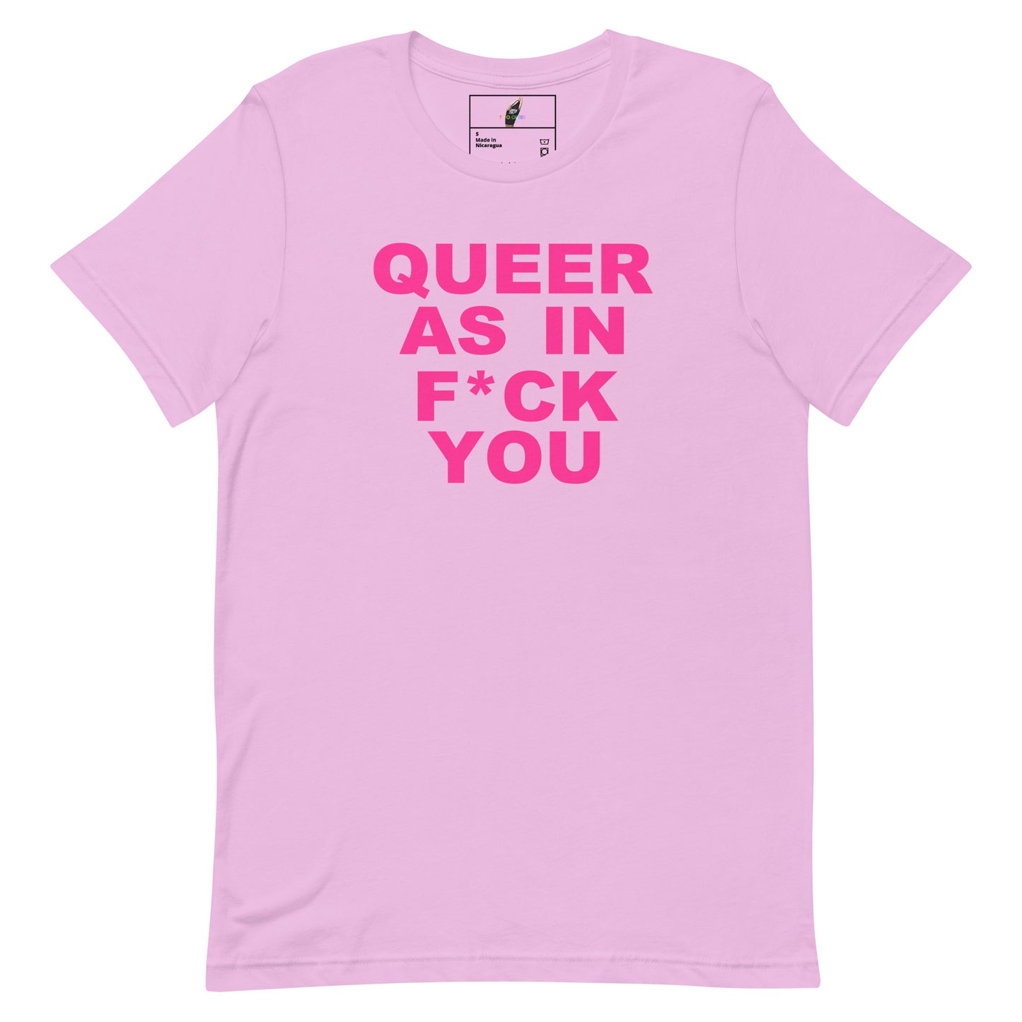 A light pink short-sleeve t-shirt with bold hot pink text on the front reading 'QUEER AS IN F*CK YOU'. The shirt is displayed flat against a clean white background, showing a small brand label inside the collar.