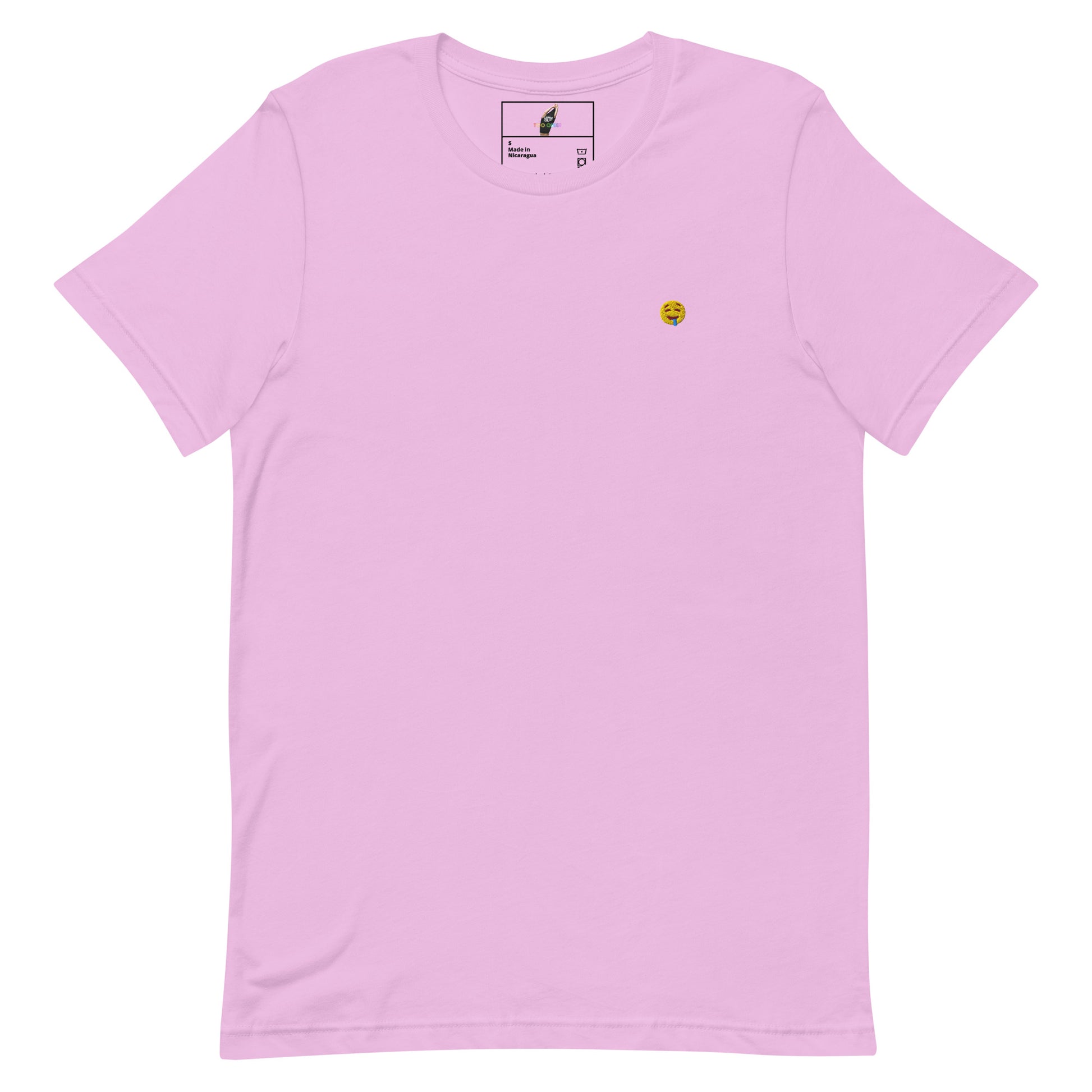 A light pink short-sleeve crewneck t-shirt with a small yellow smiley face graphic printed on the left chest, displayed flat against a solid white background.