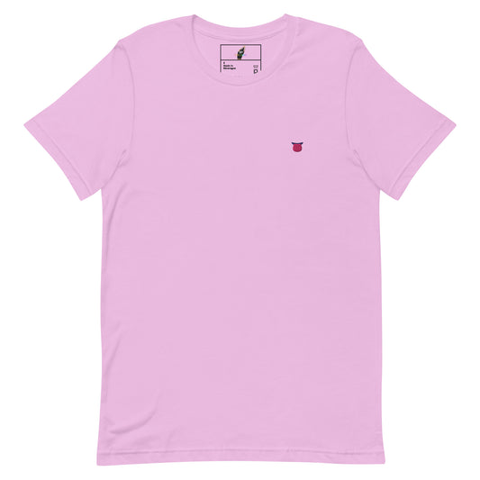 A light pink short-sleeve crewneck t-shirt with a small embroidered red and white graphic on the left chest, displayed flat against a solid white background.