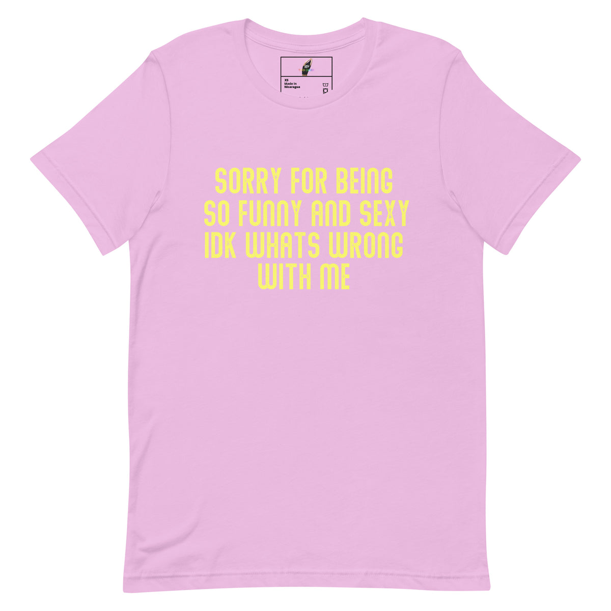 A light pink short-sleeve t-shirt with yellow text on the front that reads 'SORRY FOR BEING SO FUNNY AND SEXY IVA WHATS WRONG WITH ME'.