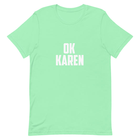 A mint green short-sleeve crewneck t-shirt with the words 'OK KAREN' printed in bold white block letters across the chest, displayed on a solid white background.