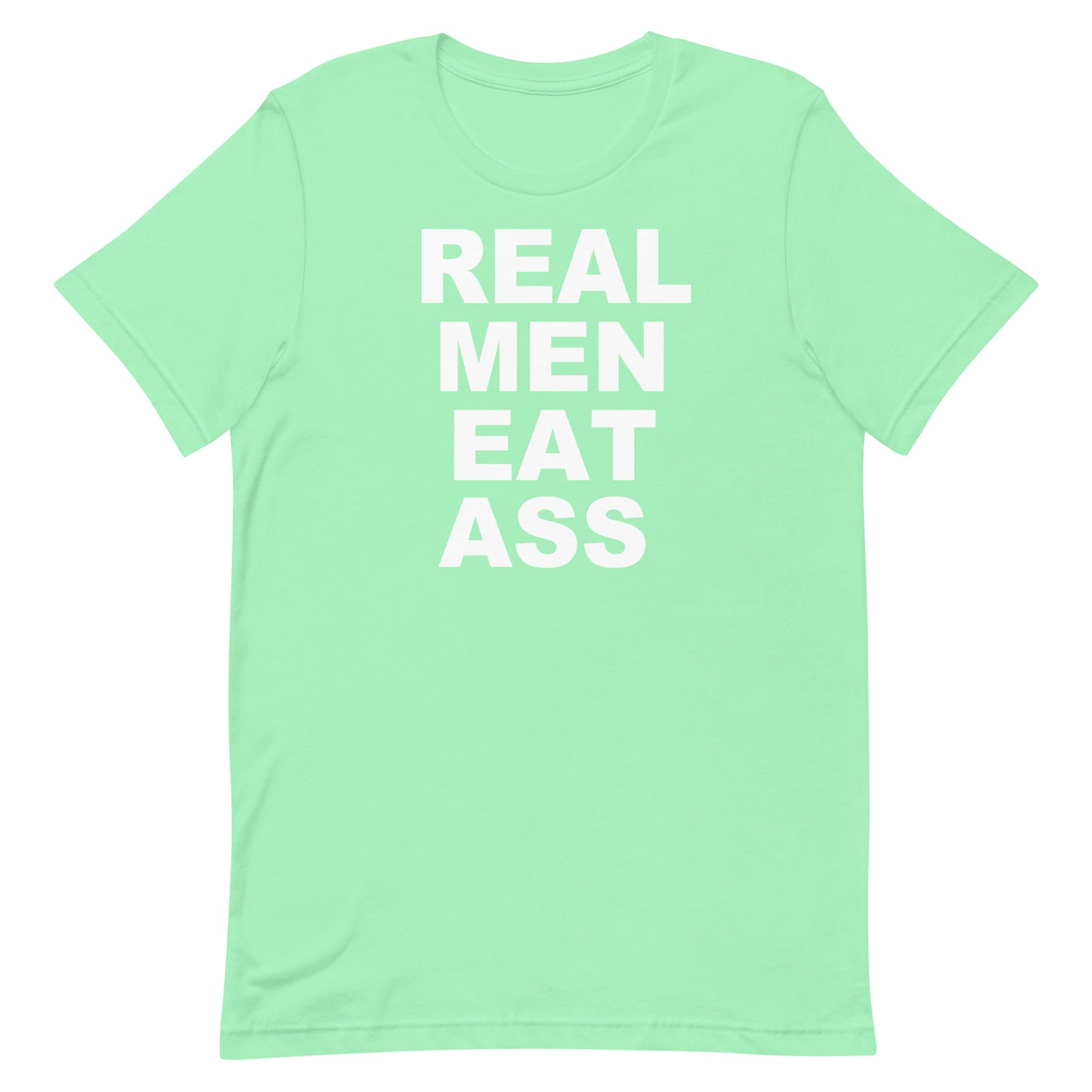 A mint green short-sleeve t-shirt with the phrase 'REAL MEN EAT ASS' printed in bold white capital letters on the front, displayed against a solid white background.