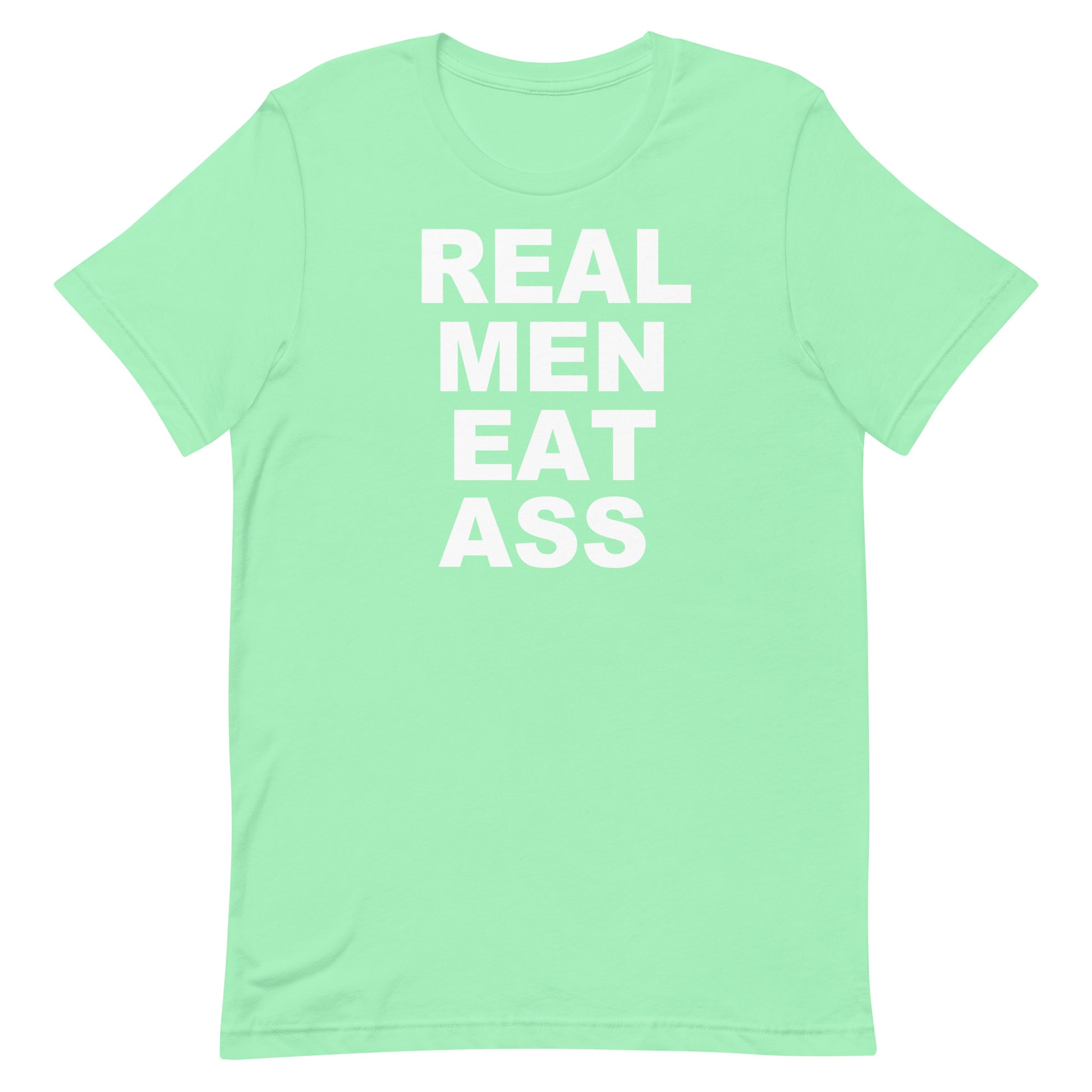A mint green short-sleeve t-shirt with the phrase 'REAL MEN EAT ASS' printed in bold white capital letters on the front, displayed against a solid white background.