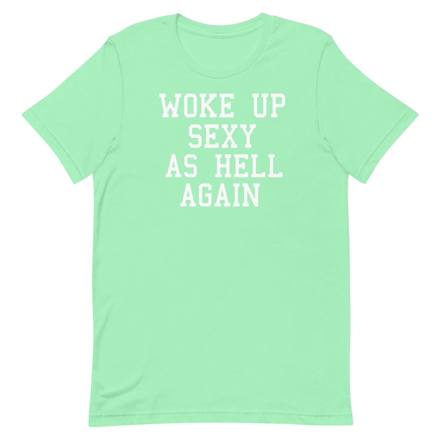 A mint green short-sleeve t-shirt with the phrase 'WOKE UP SEXY AS HELL AGAIN' printed in white block letters across the chest, displayed on a solid white background.