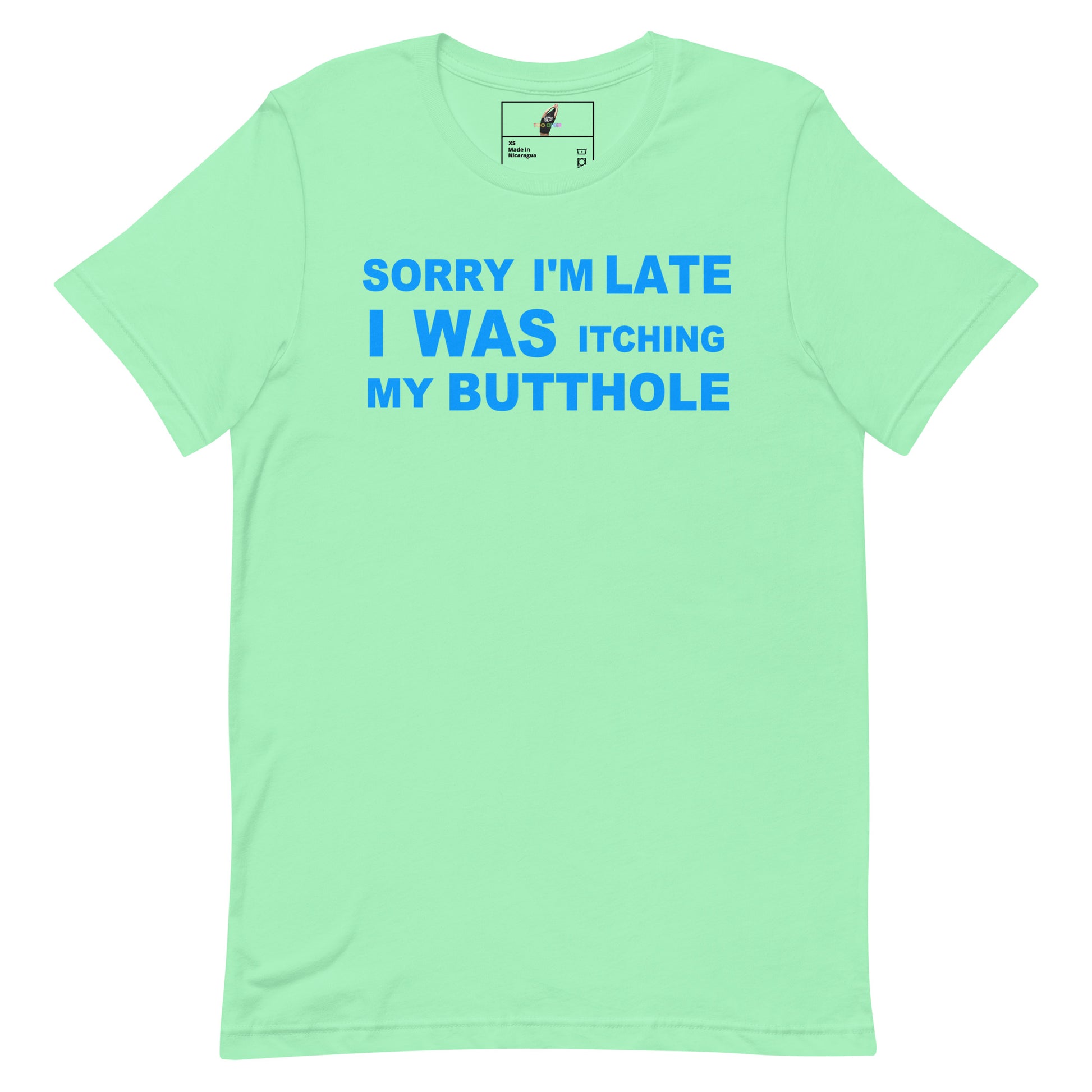 A mint green short-sleeve t-shirt with blue text on the front reading 'SORRY I'M LATE I WAS ITCHING MY BUTTOHOLE'.