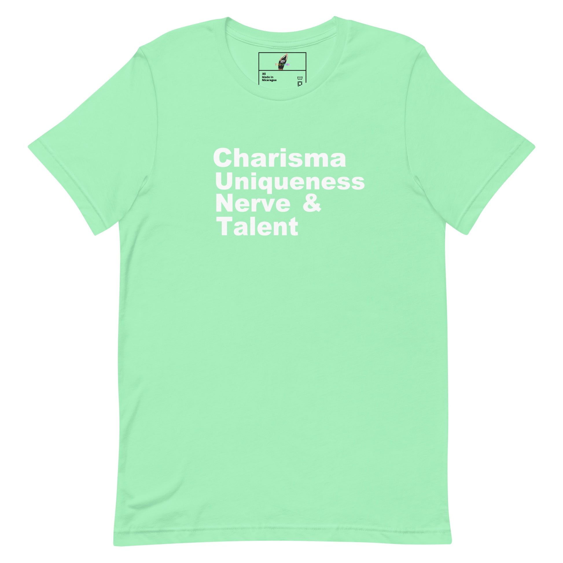 A mint green short-sleeve crewneck t-shirt with the words 'Charisma Uniqueness Nerve & Talent' printed in white block letters across the chest, displayed on a solid white background.