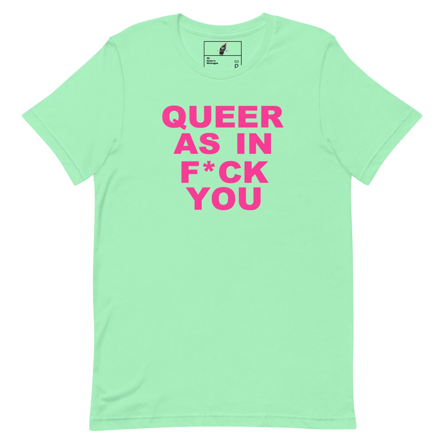 A mint green short-sleeve t-shirt with bold pink text on the front reading 'QUEER AS IN F*CK YOU'. The shirt is displayed flat against a solid white background, with a small brand label visible inside the collar.