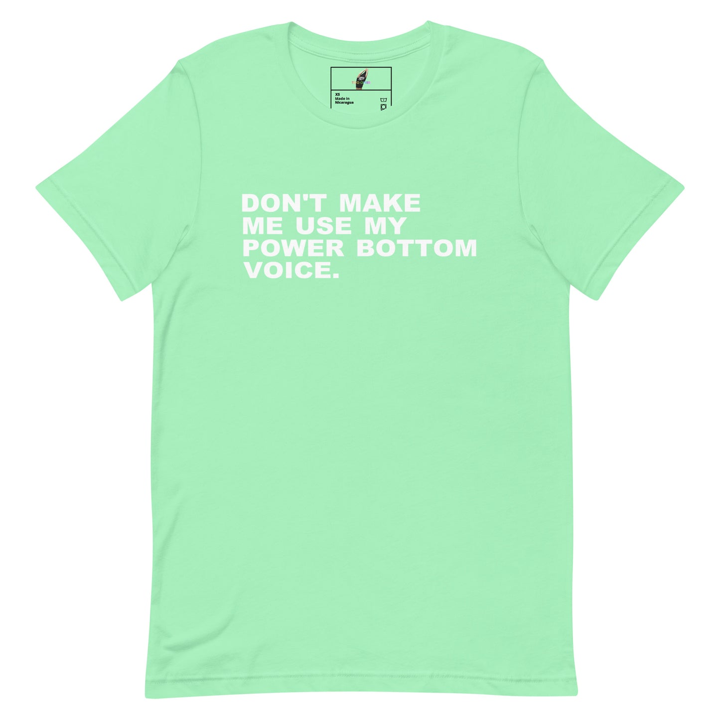 A mint green short-sleeve t-shirt with the phrase 'DON'T MAKE ME USE MY POWER BOTTOM VOICE.' printed in white capital letters across the chest, displayed flat against a white background.