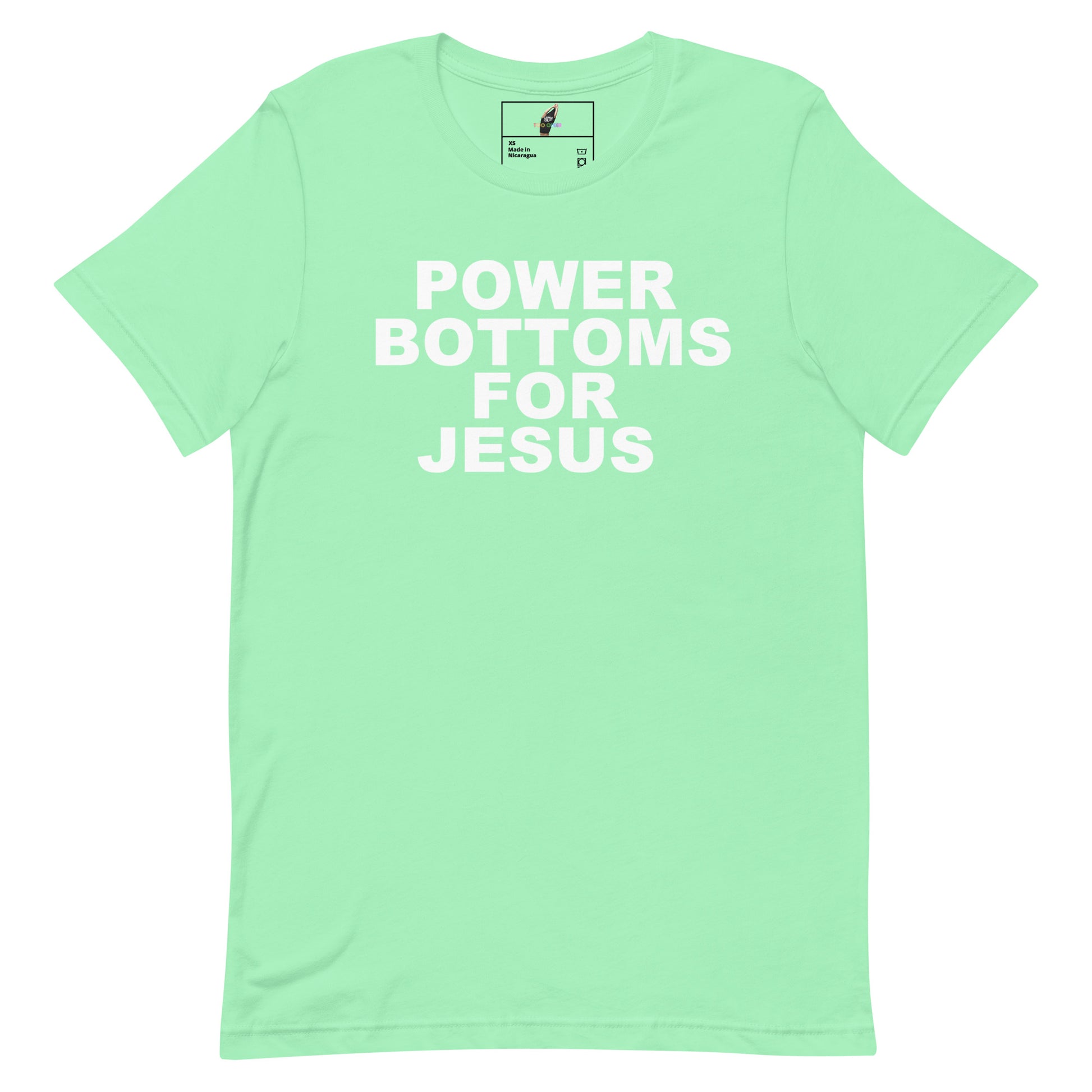 A mint green short-sleeve t-shirt with the phrase 'POWER BOTTOMS FOR JESUS' printed in bold white capital letters across the chest, displayed flat against a solid white background.