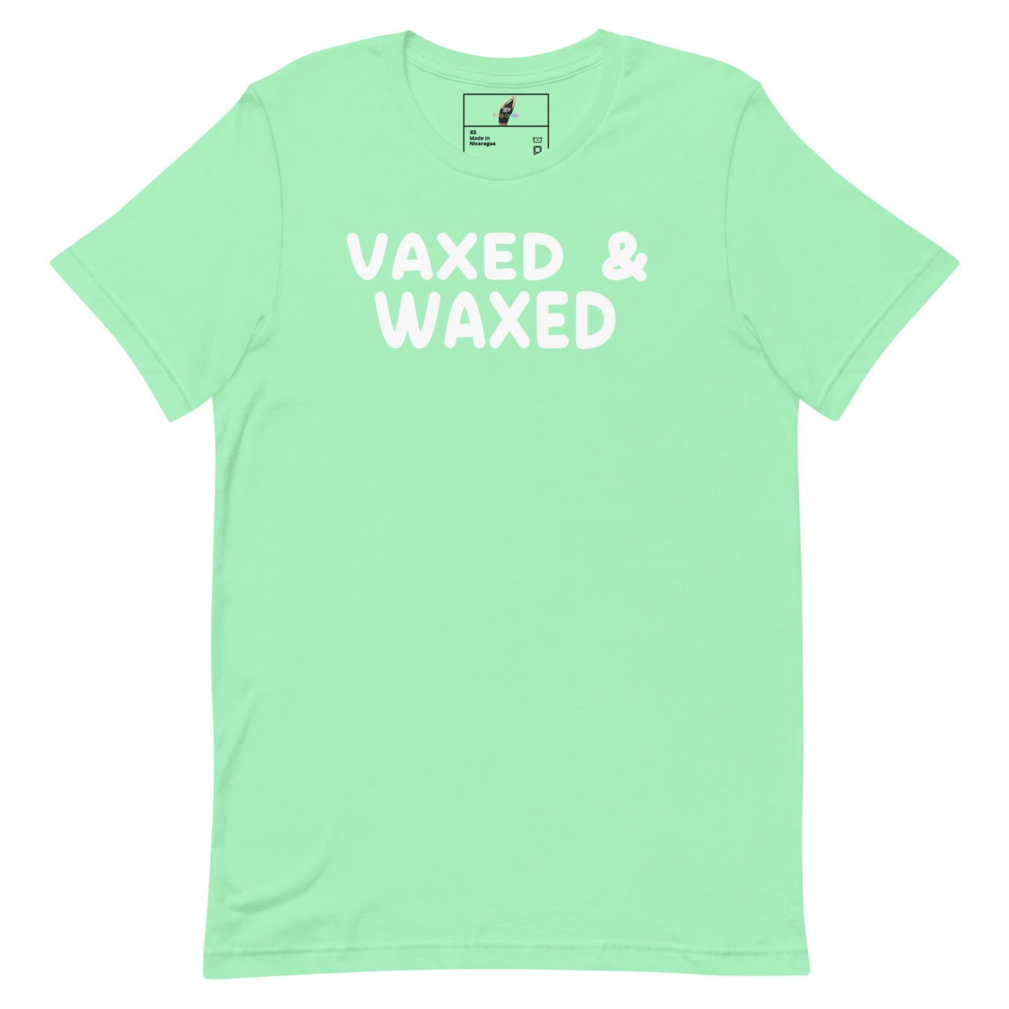 A mint green short-sleeve t-shirt with the words 'VAXED & WAXED' printed in white across the chest, displayed flat against a solid white background.