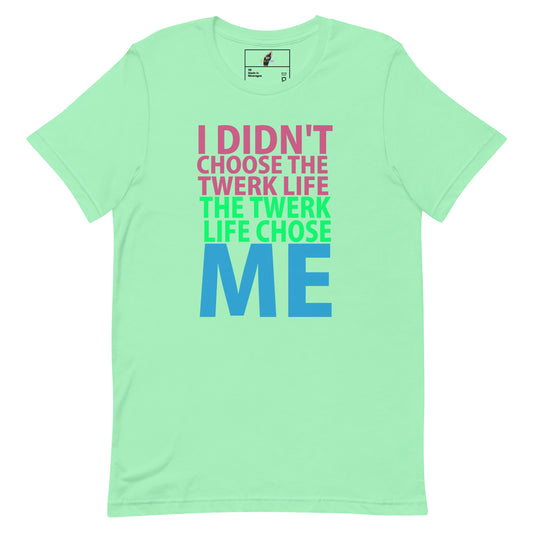 A mint green short-sleeve t-shirt with a colorful text graphic on the front reading 'I DIDN'T CHOOSE THE TWERK LIFE THE TWERK LIFE CHOSE ME' in pink, green, and blue lettering.