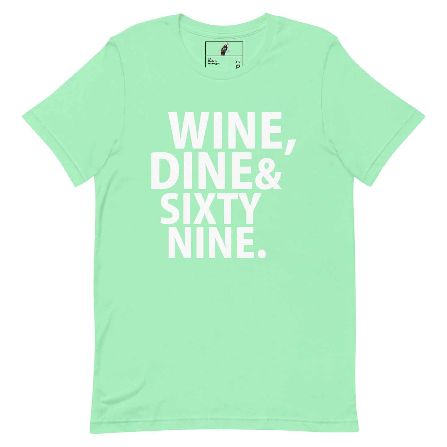 A mint green short-sleeve t-shirt with bold white text reading 'WINE, DINE & SIXTY NINE.' printed on the front, displayed flat against a solid white background.