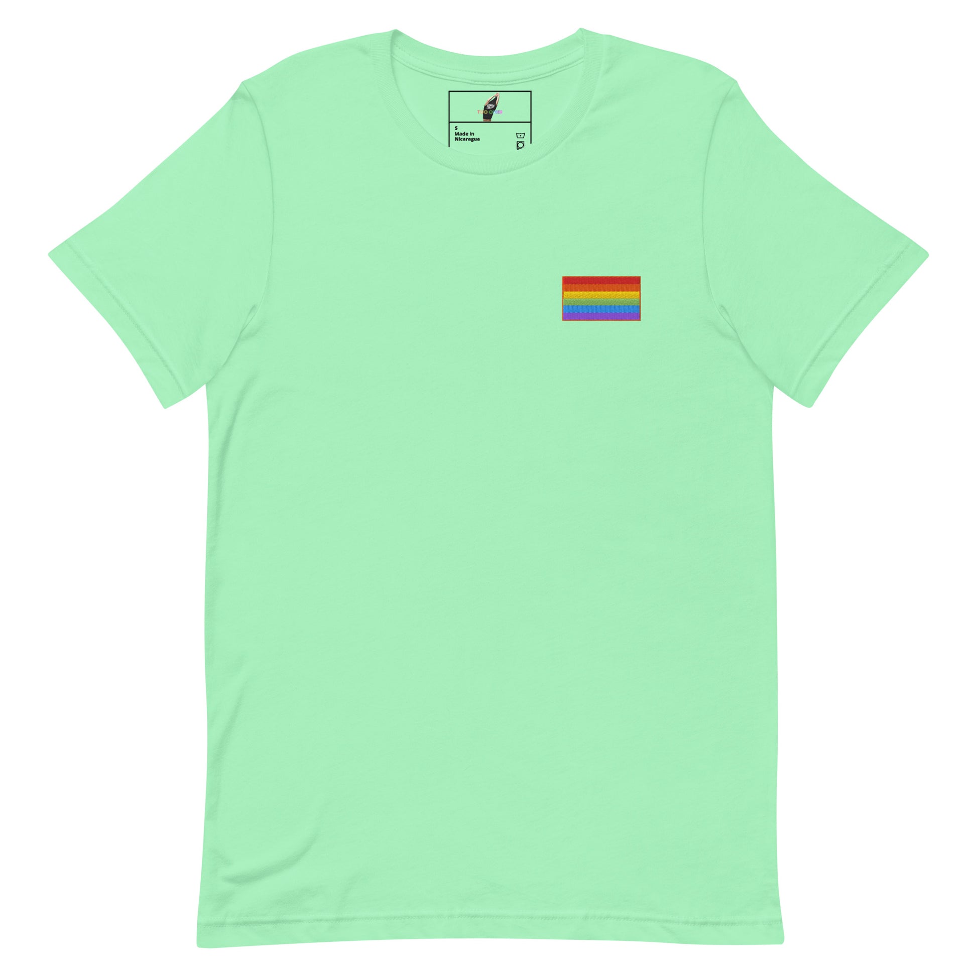 A mint green short-sleeve crewneck t-shirt featuring a small rainbow pride flag graphic on the left chest, displayed against a solid white background.