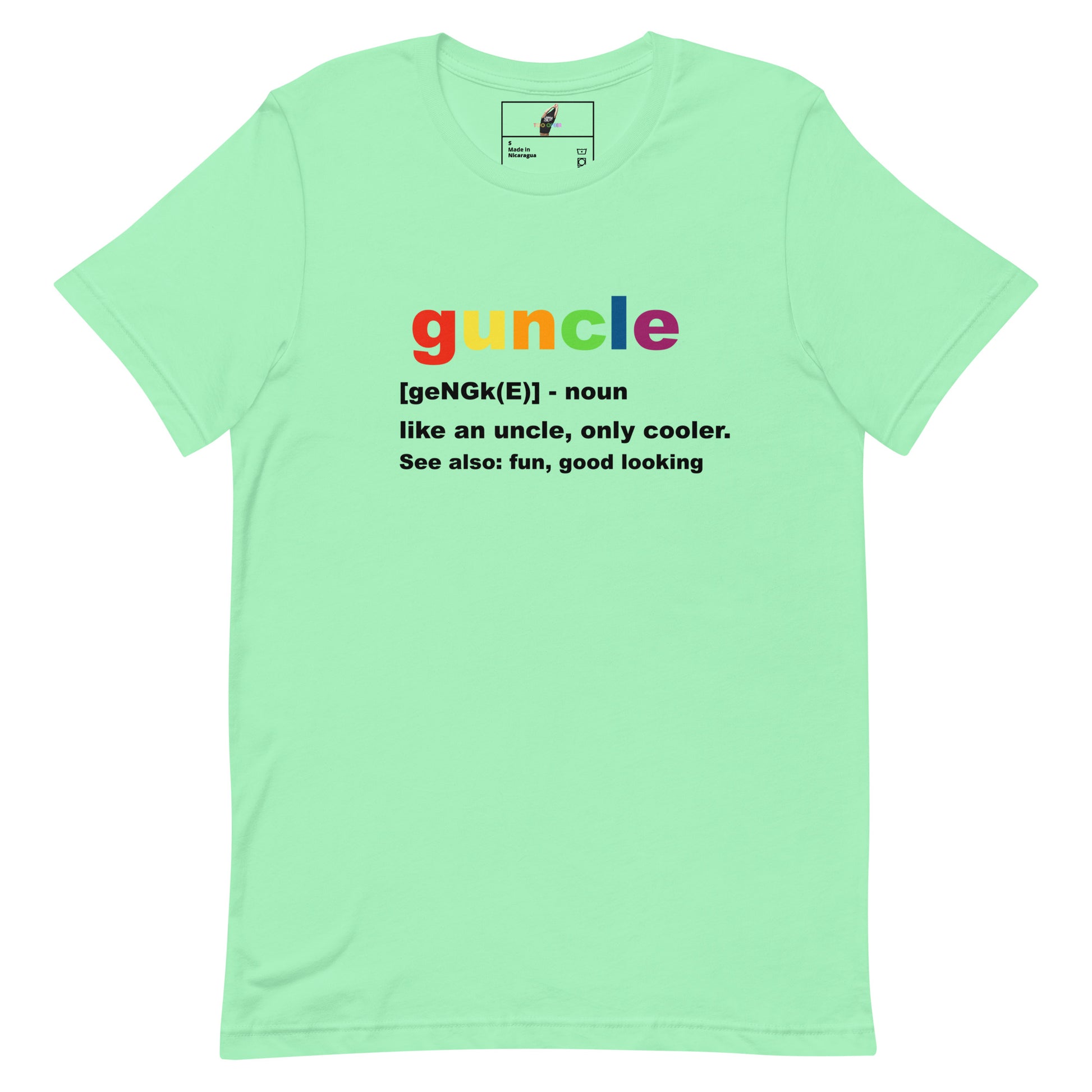A mint green short-sleeve t-shirt with a colorful graphic on the chest. The graphic features the word 'guncle' in a rainbow gradient, followed by a dictionary-style definition in black text: '[geNGk(E)] - noun like an uncle, only cooler.