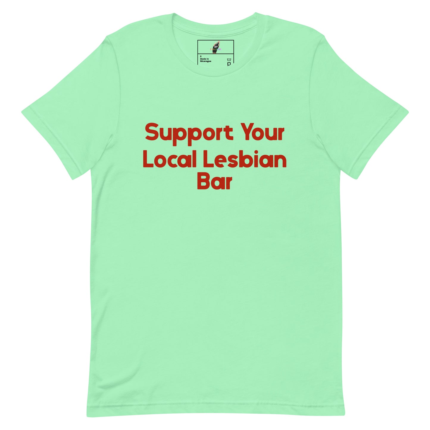 A mint green short-sleeve t-shirt with the phrase 'Support Your Local Lesbian Bar' printed in red across the chest, displayed on a solid white background.