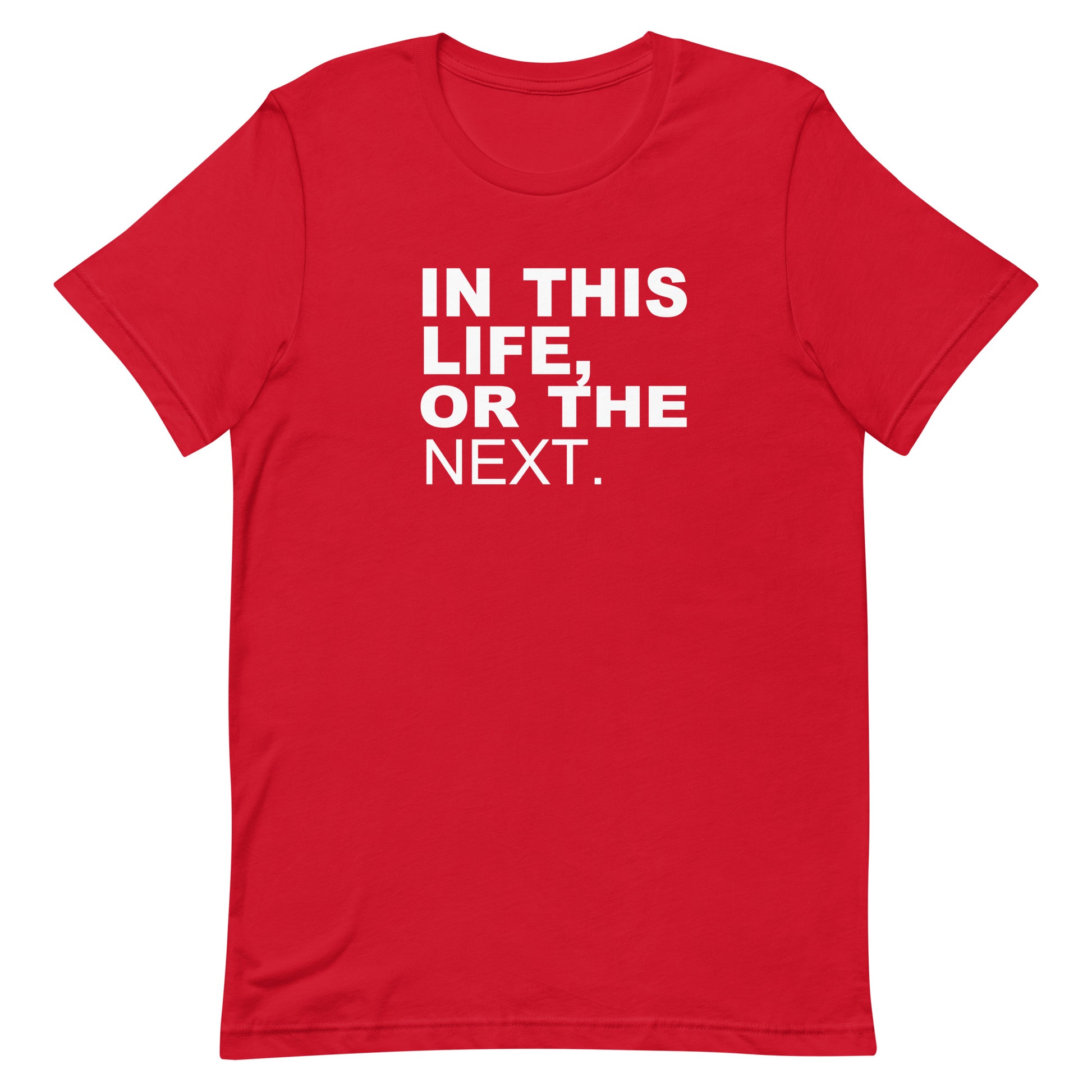 A red short-sleeve crewneck t-shirt with the phrase 'IN THIS LIFE, OR THE NEXT.' printed in bold white capital letters on the chest, shown against a plain white background.