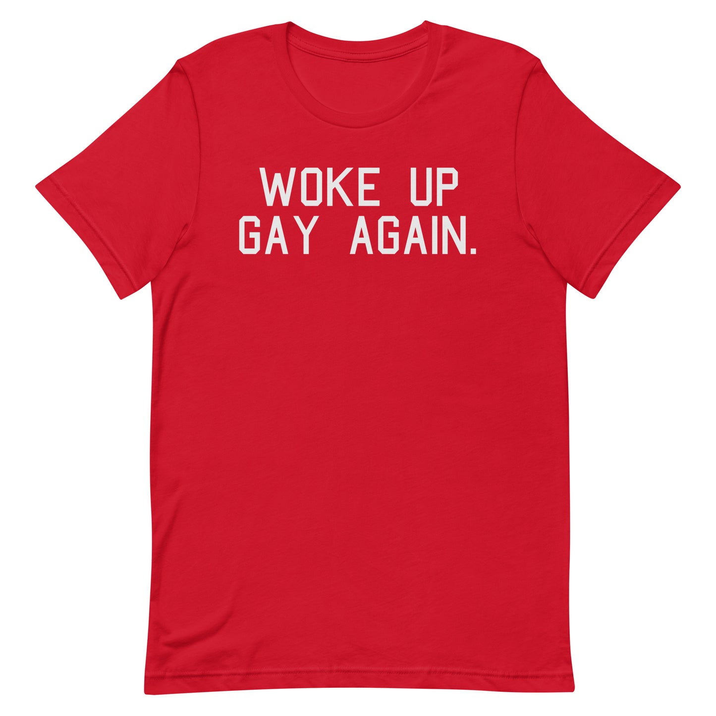 A red short-sleeve crewneck t-shirt with the phrase 'WOKE UP GAY AGAIN.' printed in white block letters across the chest, displayed on a solid white background.