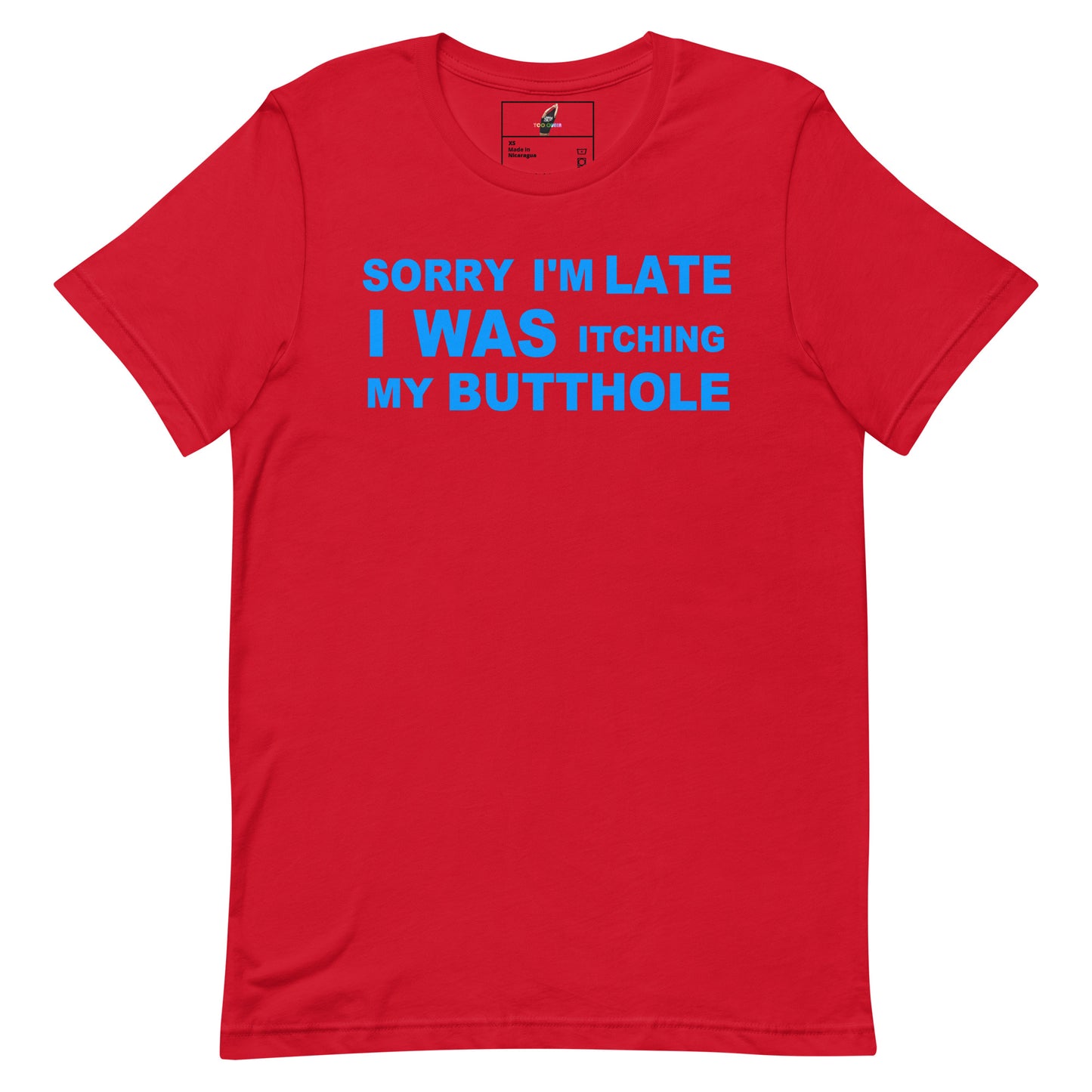 A red short-sleeve crewneck t-shirt with the text 'SORRY I'M LATE I WAS ITCHING MY BUTTHOLE' printed in bright blue across the chest, displayed on a solid white background.