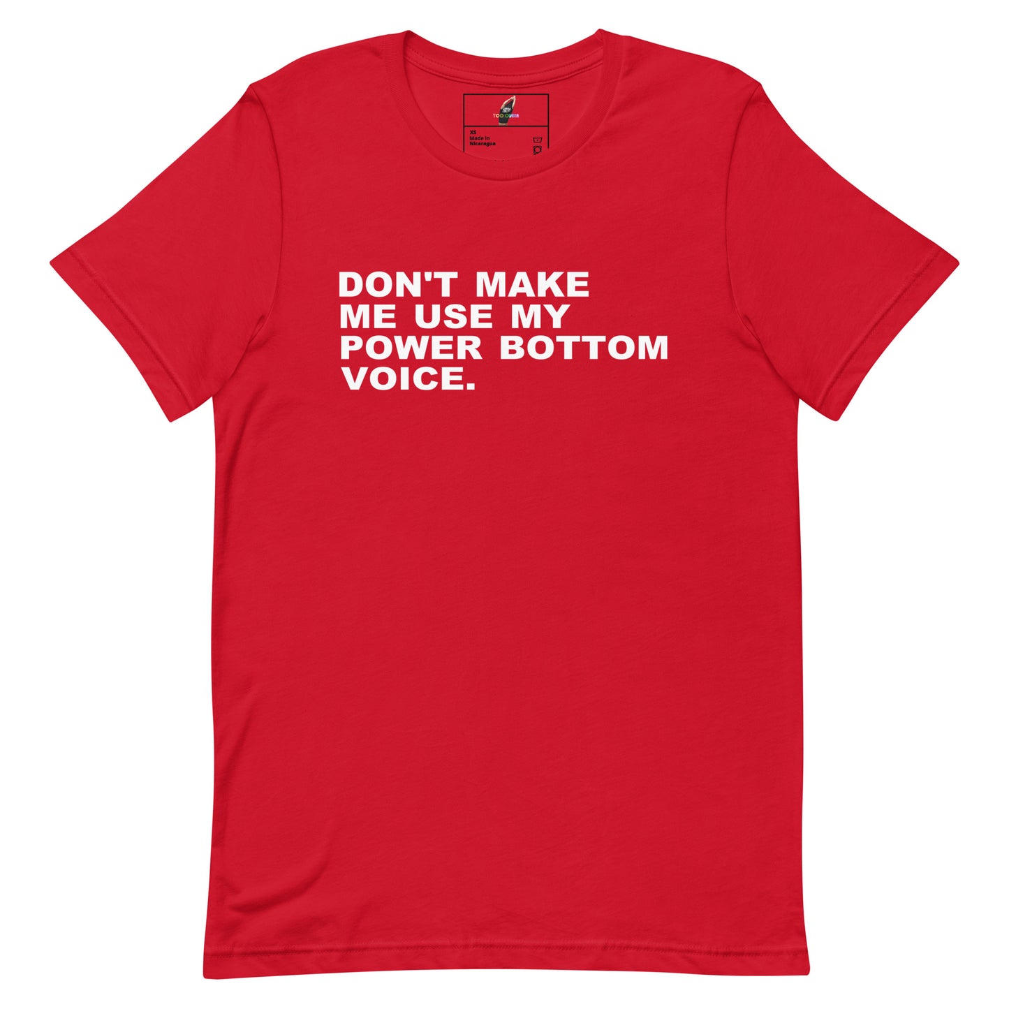 A red short-sleeve crewneck t-shirt with bold white text on the chest reading 'DON'T MAKE ME USE MY POWER BOTTOM VOICE.' displayed on a clean white background.