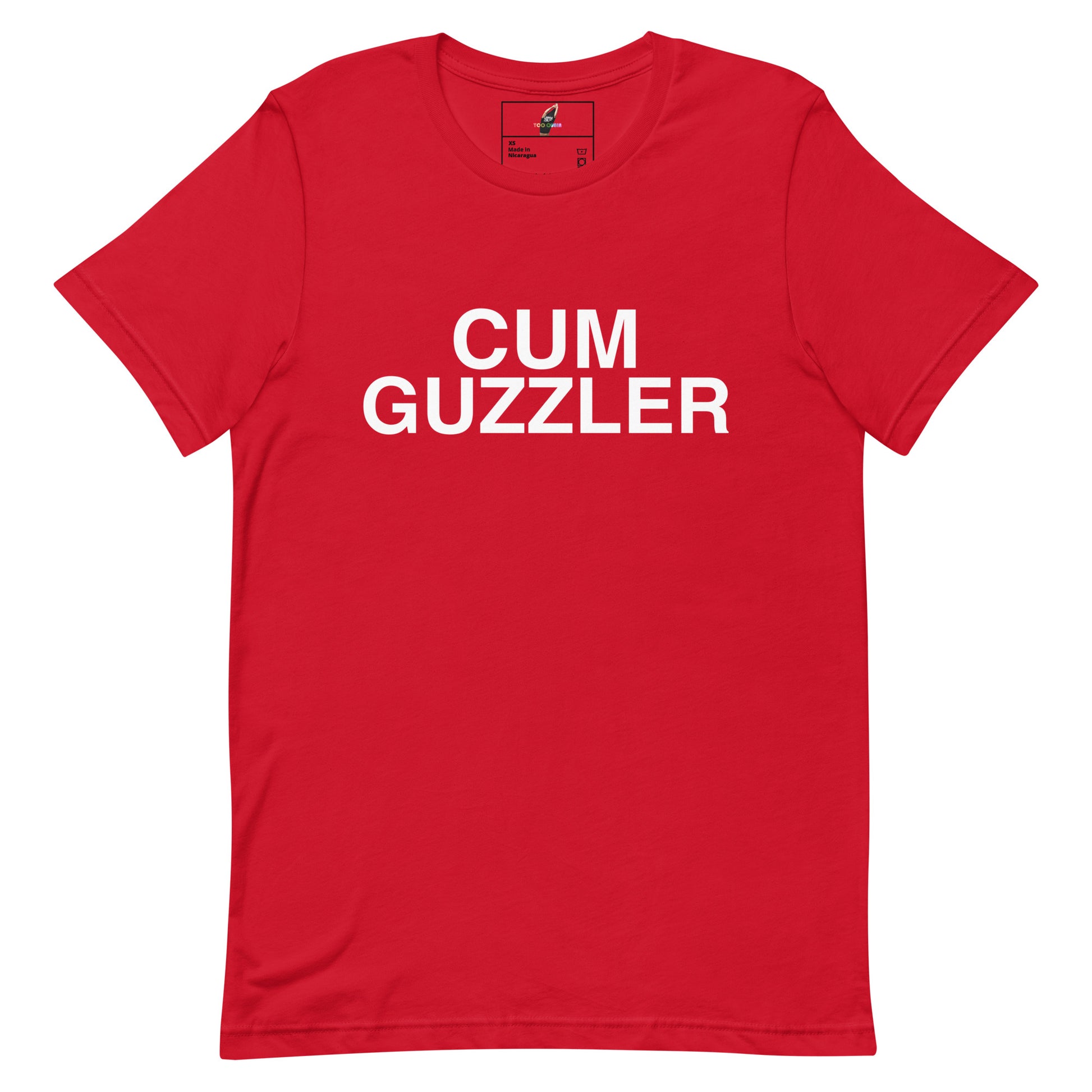 A red short-sleeve crewneck t-shirt with the words 'CUM GUZZLER' printed in bold white capital letters across the chest, displayed flat against a plain white background.