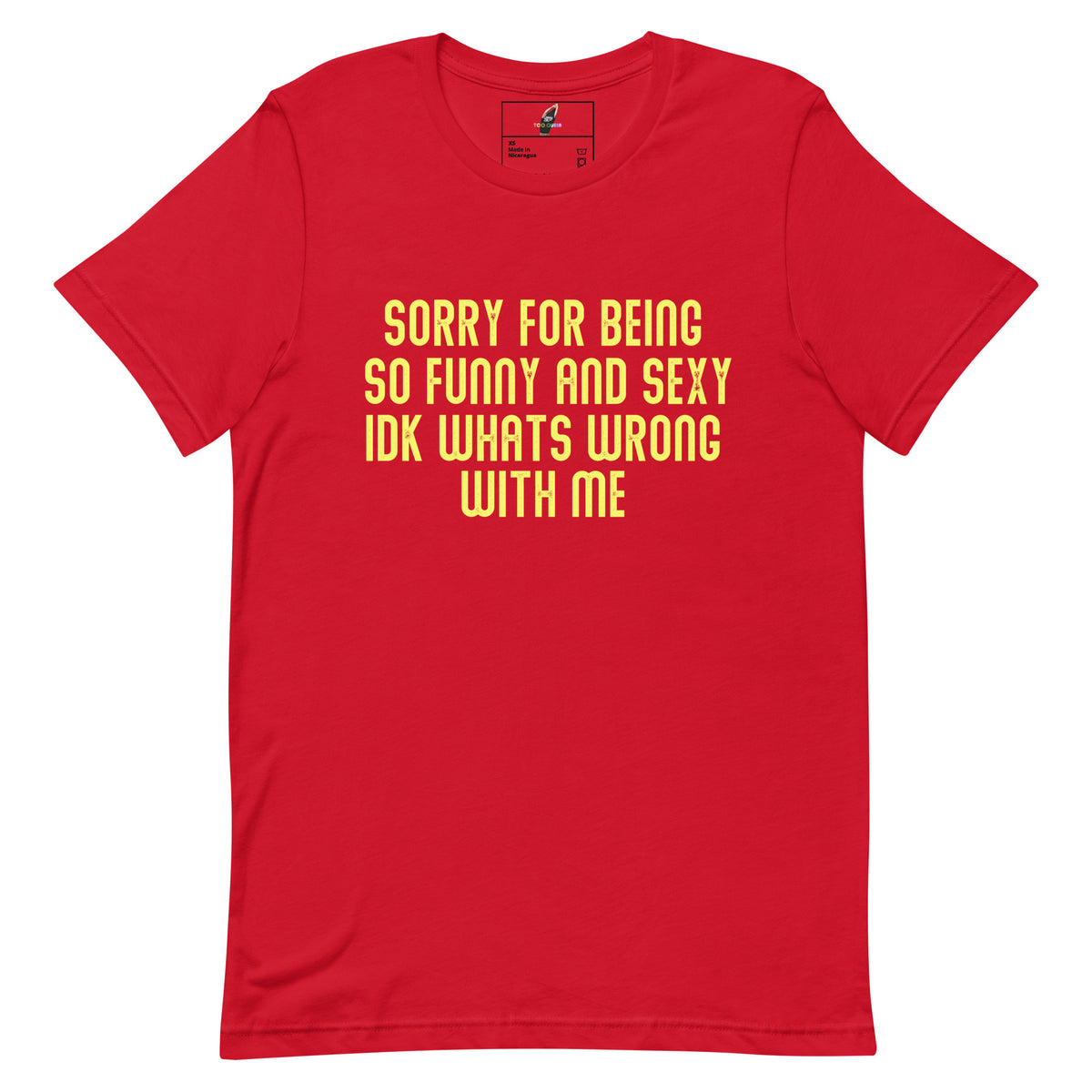 A red short-sleeve crewneck t-shirt with yellow text on the front that reads 'SORRY FOR BEING SO FUNNY AND SEXY IDK WHATS WRONG WITH ME'.