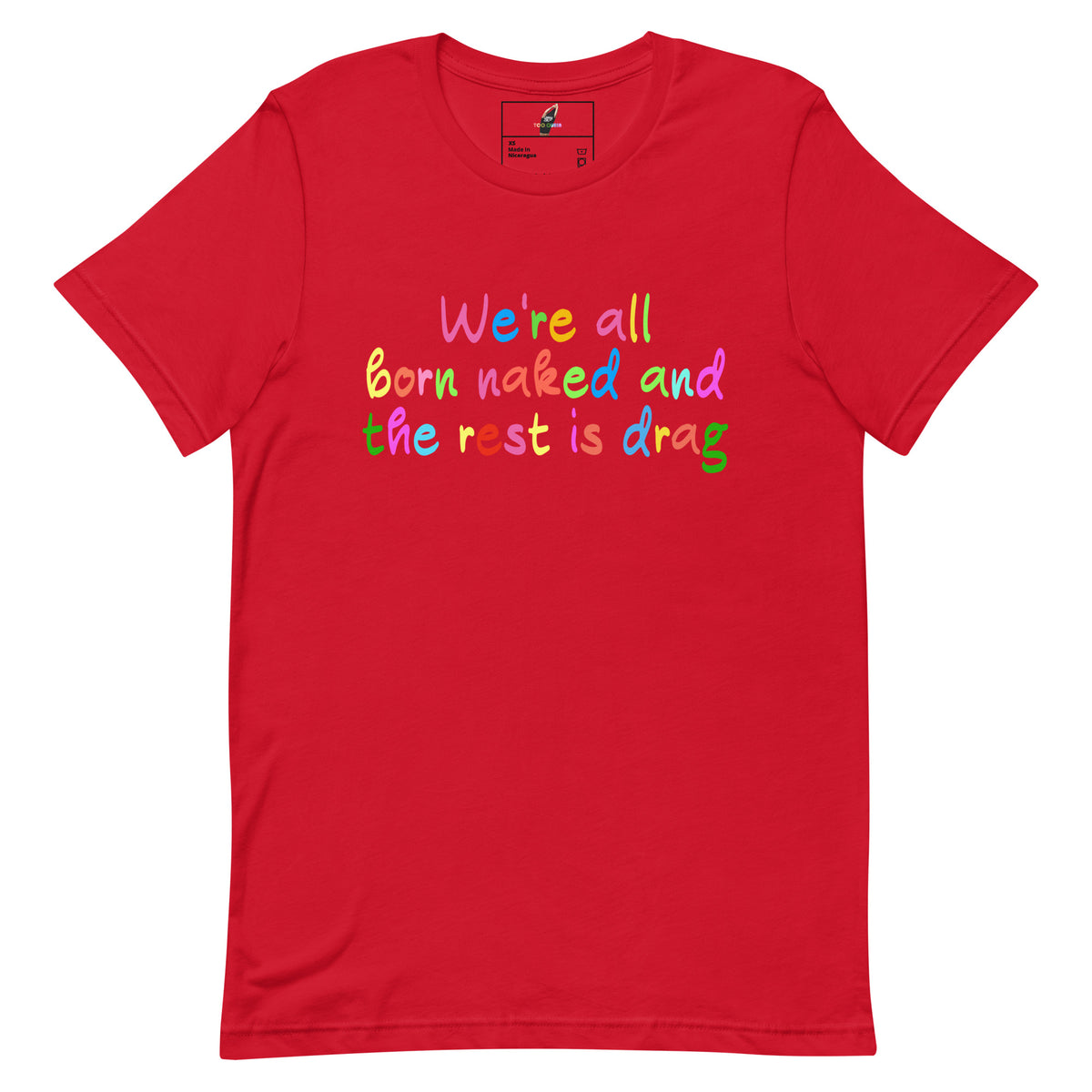 A red short-sleeve crewneck t-shirt with a colorful text graphic on the chest that reads 'We're all born naked and the rest is drag' in multicolored letters.
