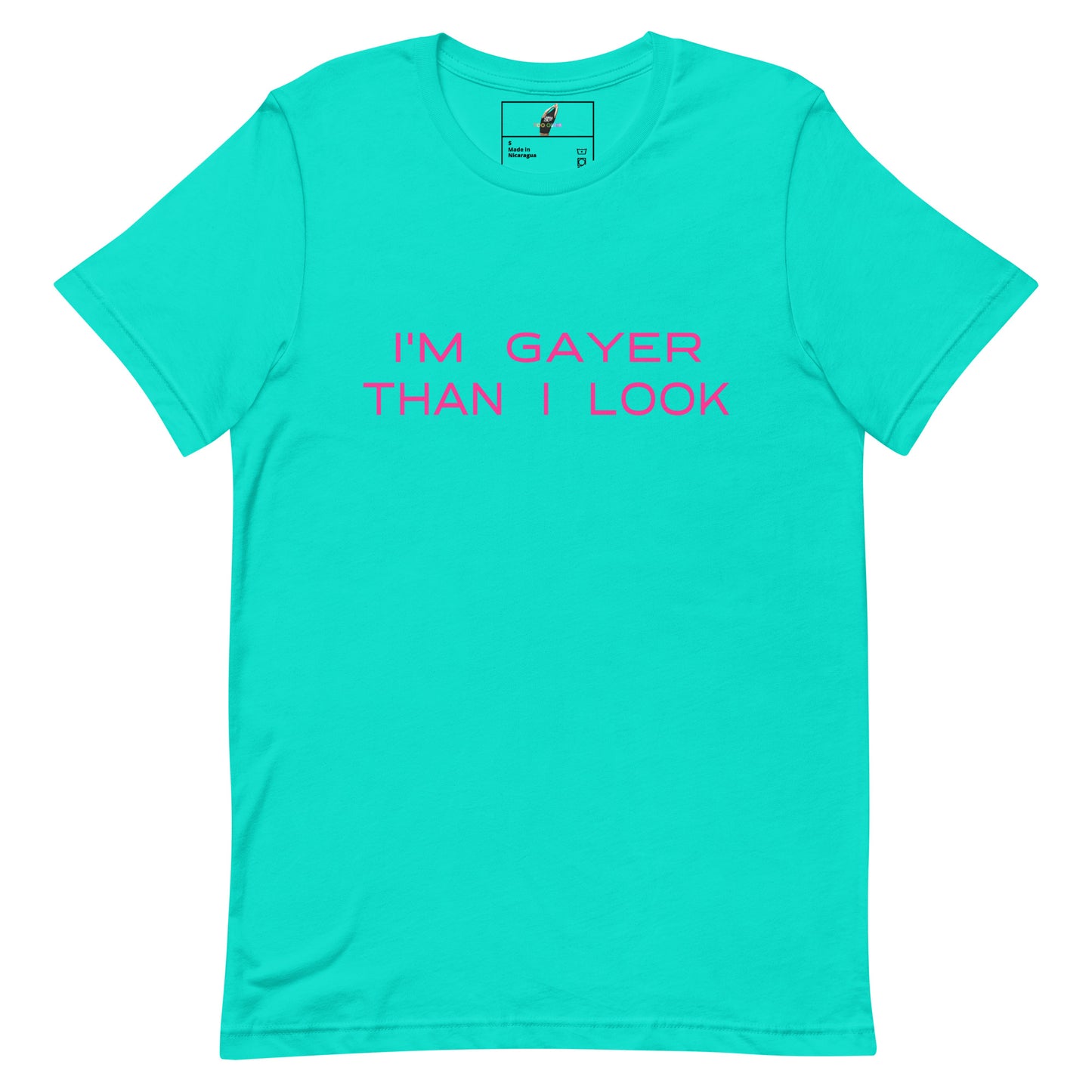 A bright turquoise short-sleeve crewneck t-shirt with the phrase 'I'M GAYER THAN I LOOK' printed in pink across the chest, displayed flat against a solid white background.