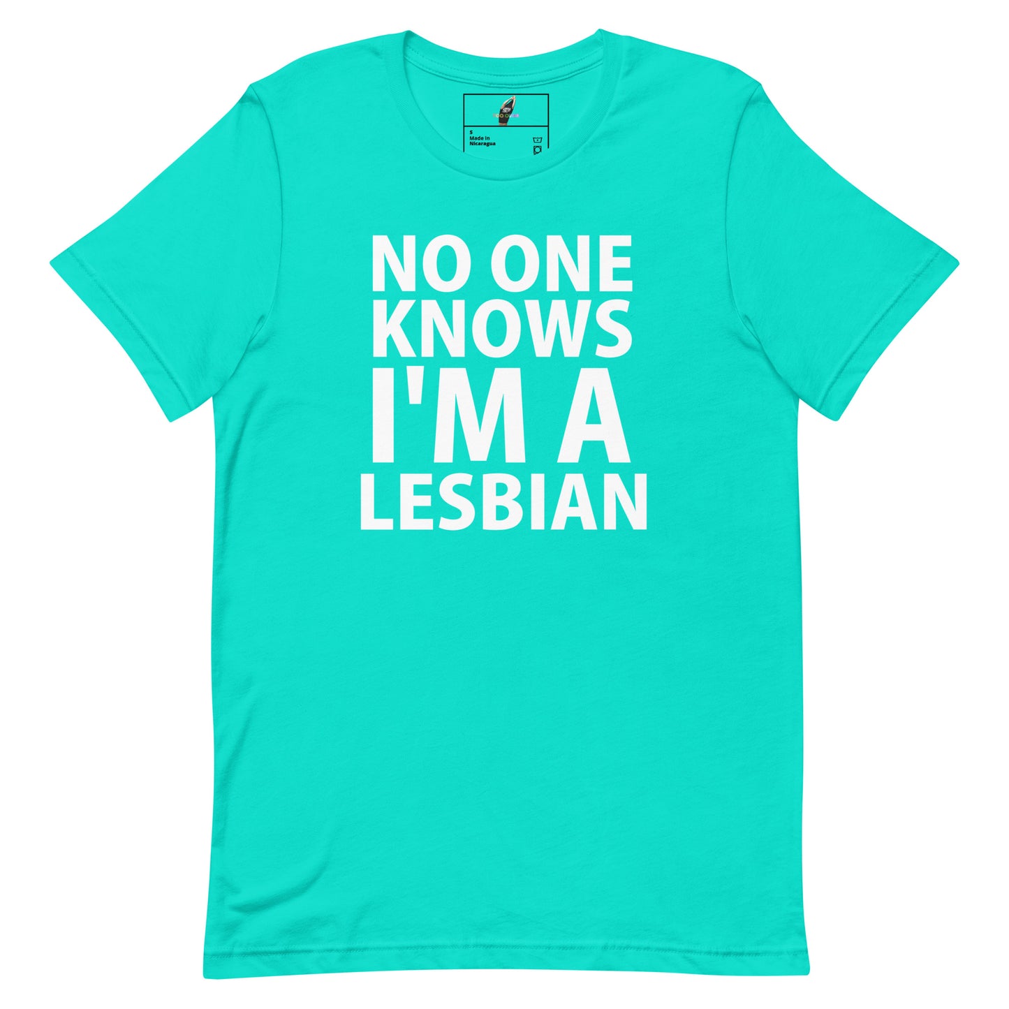 A bright turquoise short-sleeve crewneck t-shirt with bold white text on the front reading 'NO ONE KNOWS I'M A LESBIAN'. The shirt is displayed flat against a solid white background, with a small brand label visible inside the collar.