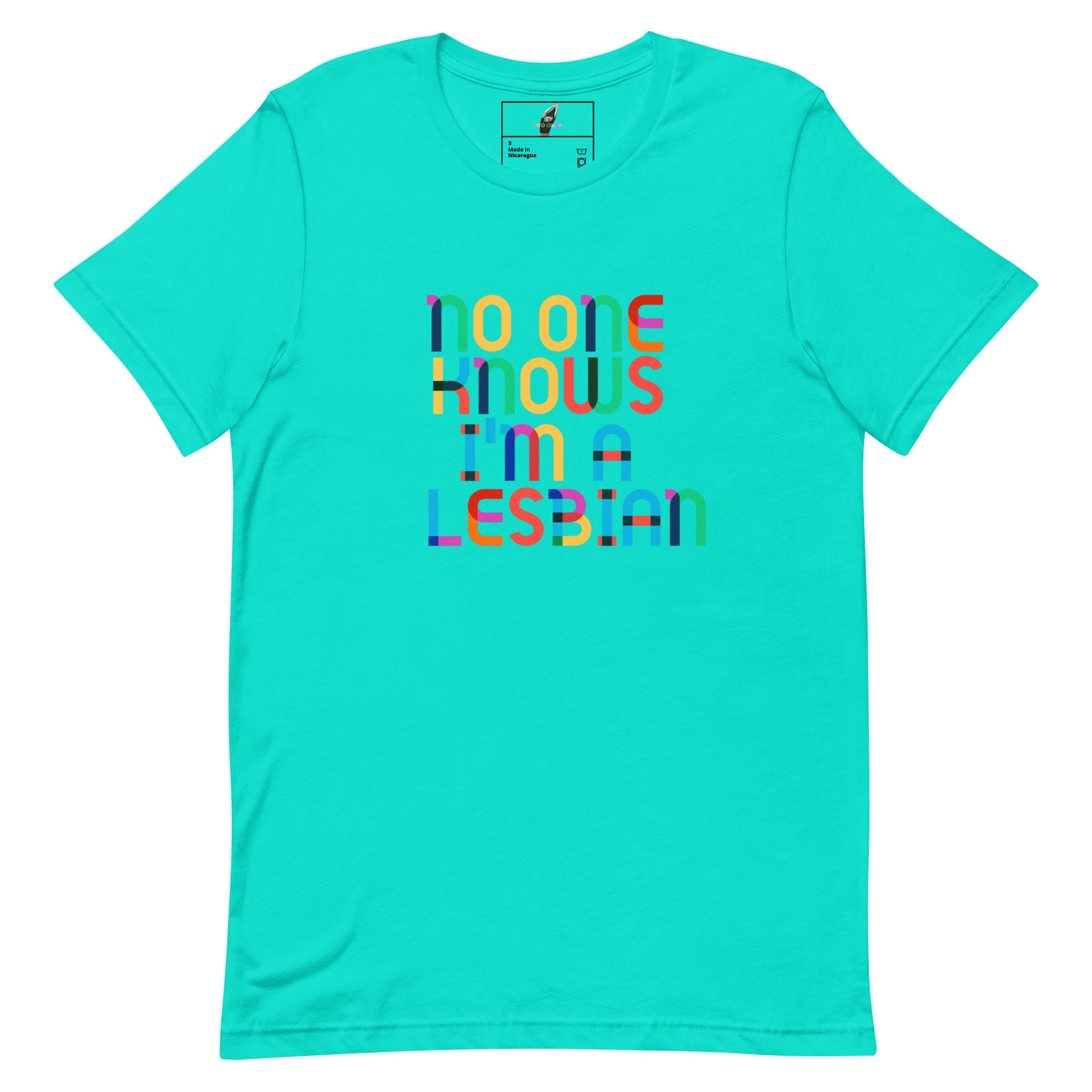 A bright turquoise short-sleeve t-shirt with a colorful graphic text print on the front reading 'NO ONE KNOWS I'M - LESBIAN' in a rainbow-striped font. The shirt is displayed flat against a solid white background.