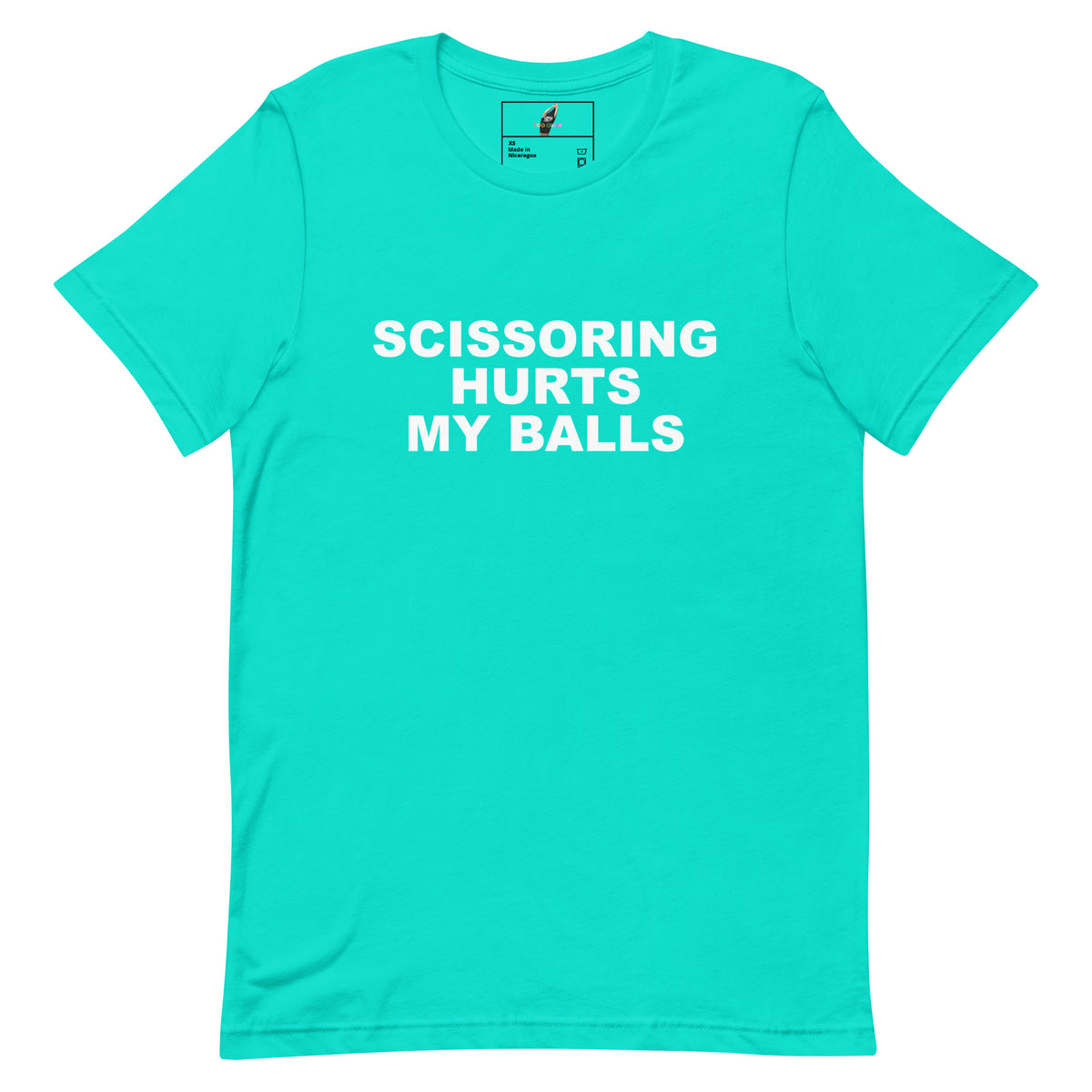 A bright turquoise short-sleeve crewneck t-shirt with bold white text on the chest reading 'SCISSORING HURTS MY BALLS'. The shirt is displayed flat against a clean white background, showing a small brand label inside the collar.