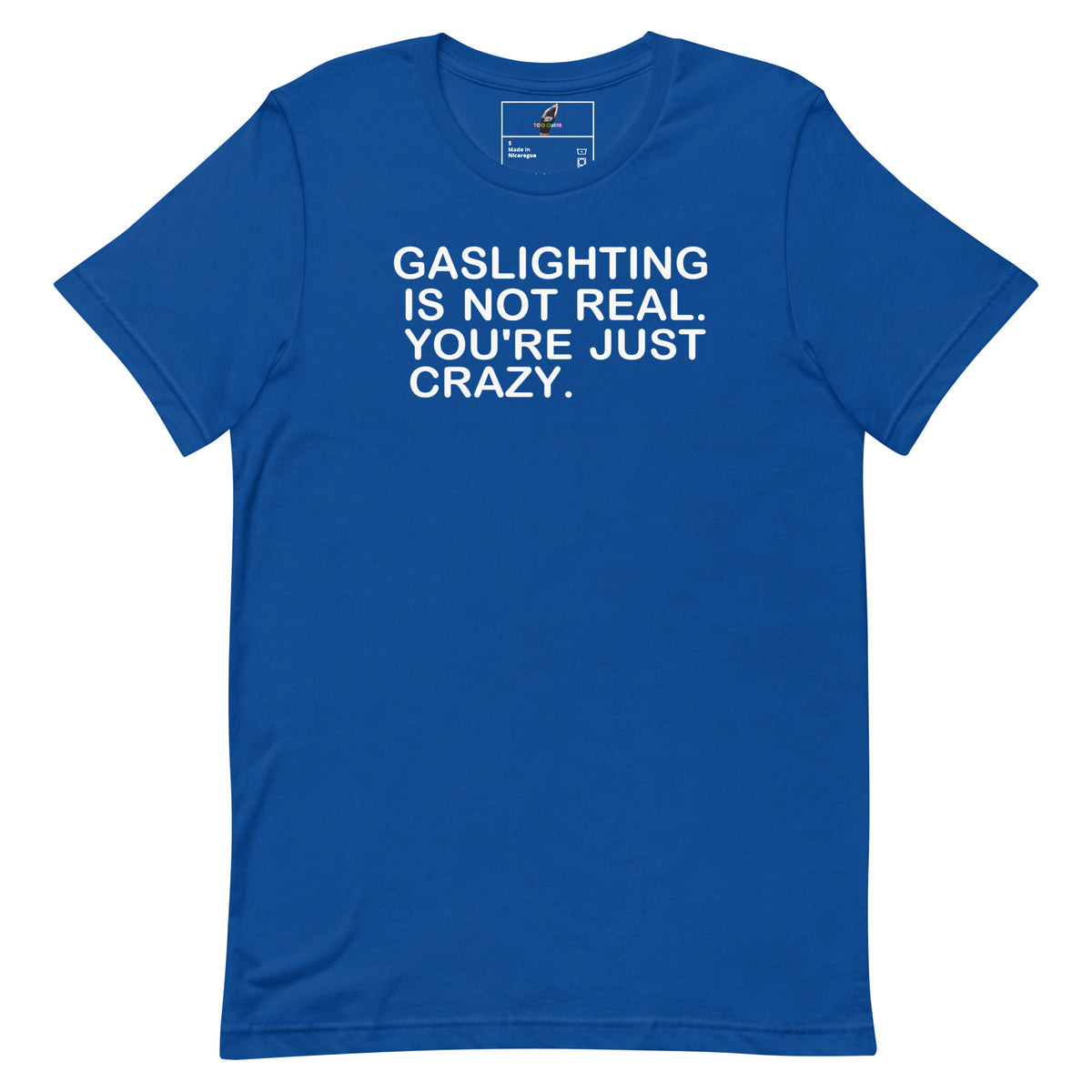 A royal blue short-sleeve t-shirt with the phrase 'GASLIGHTING IS NOT REAL. YOU'RE JUST CRAZY.