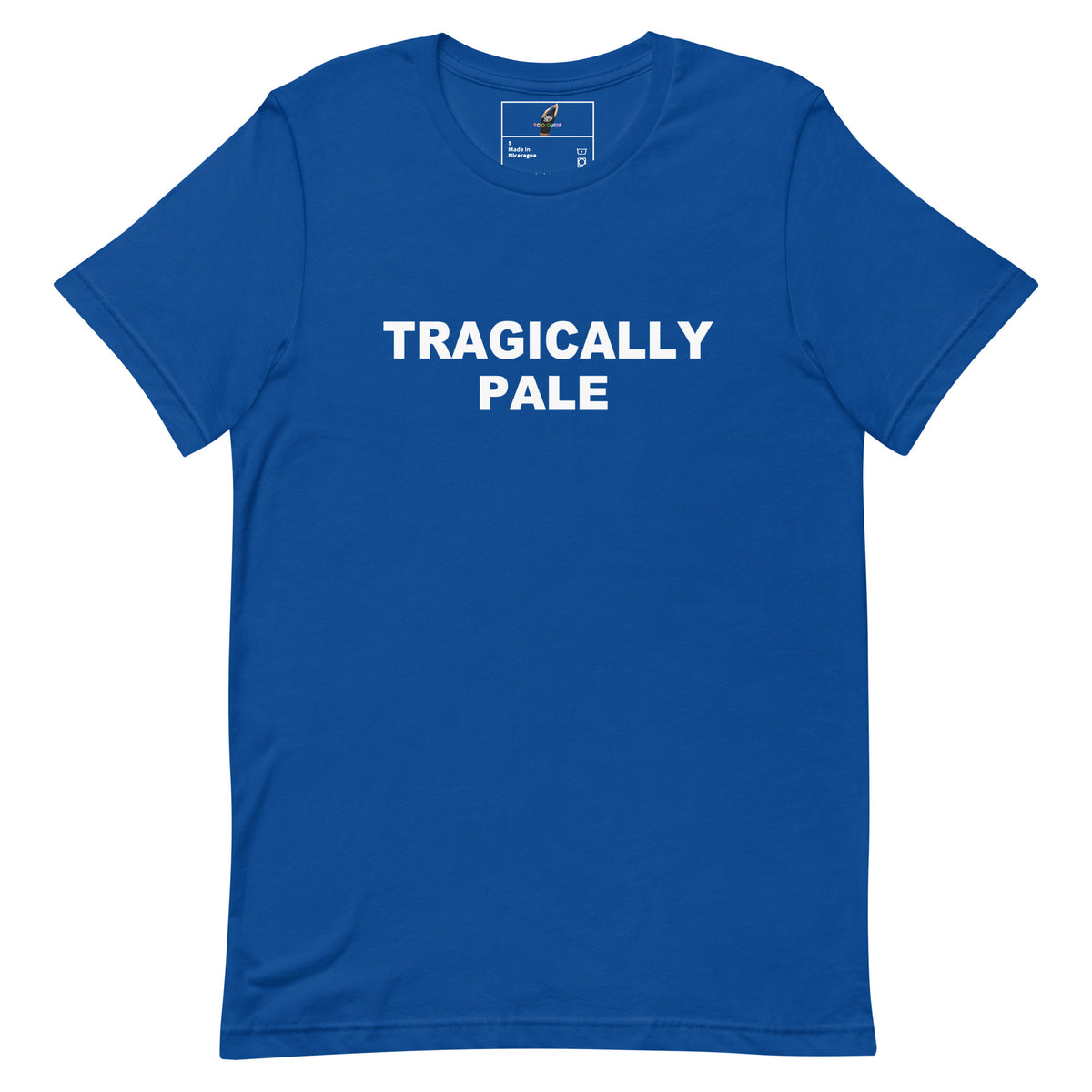 A royal blue short-sleeve crewneck t-shirt with the words 'TRAGICALLY PALE' printed in bold white capital letters across the chest, displayed on a clean white background.