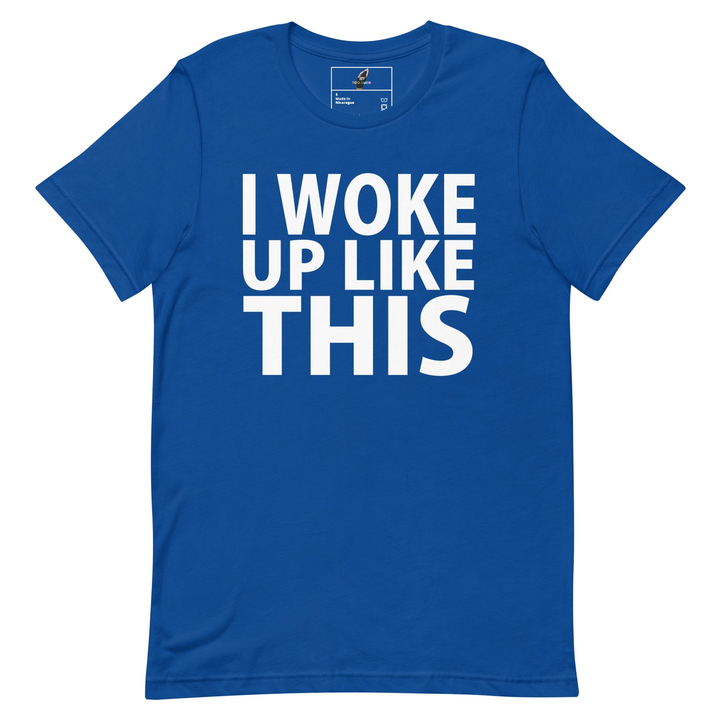 A royal blue short-sleeve t-shirt with the phrase 'I WOKE UP LIKE THIS' printed in bold white capital letters across the chest, displayed on a clean white background.