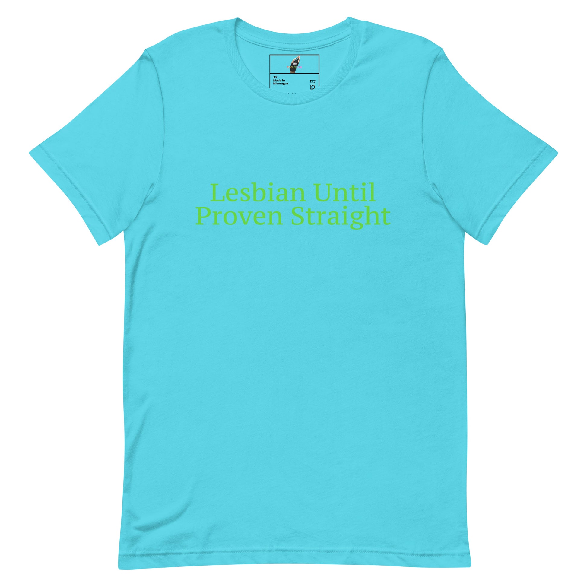 A light blue short-sleeve crewneck t-shirt with the phrase 'Lesbian Until Proven Straight' printed in lime green across the chest. The inner neck label features a small graphic of a hand holding a lit candle.